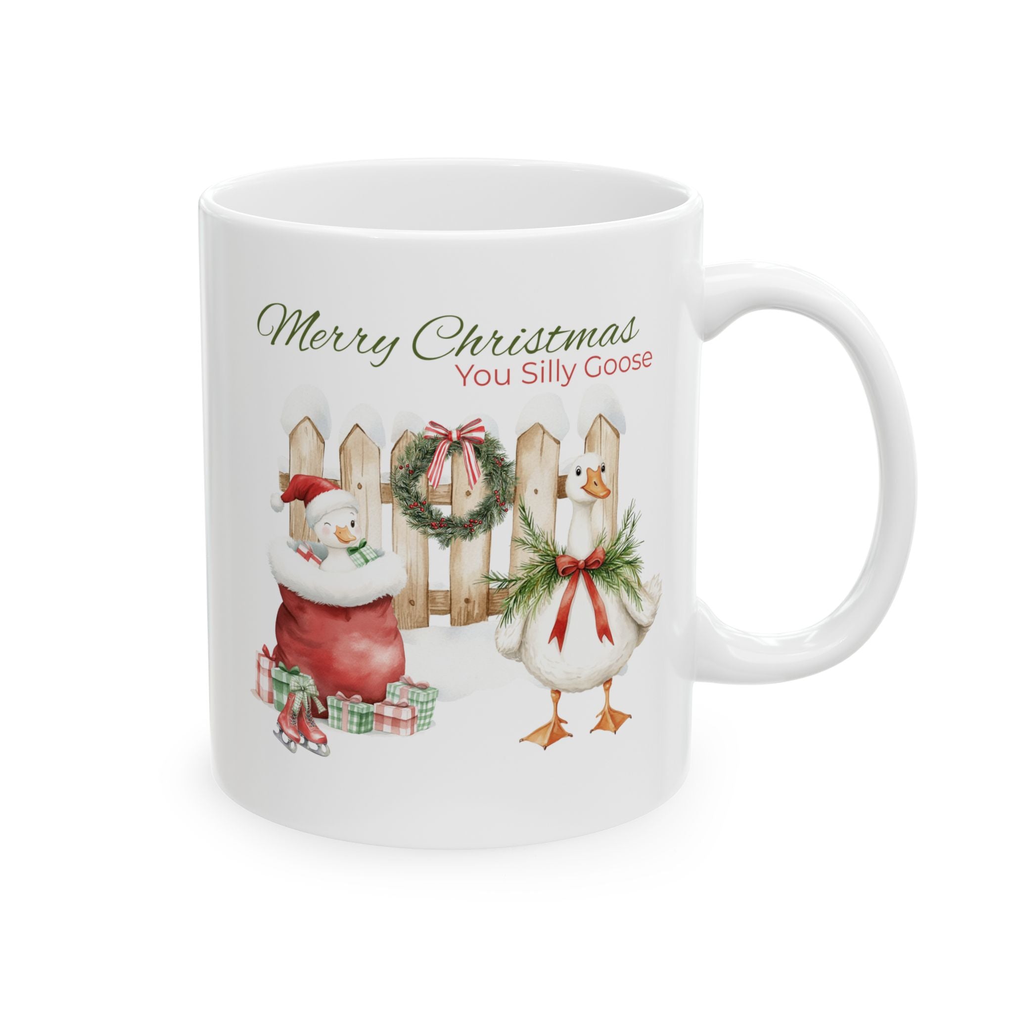 White mug with Christmas-themed design featuring a Goose, Santa, and wreath on a white background.