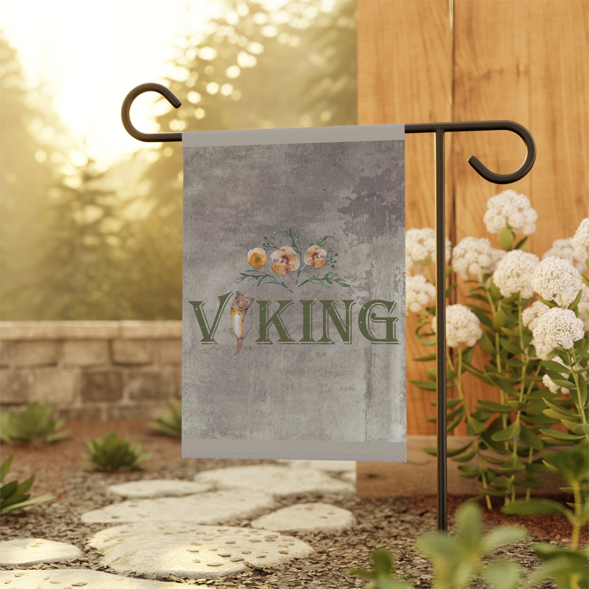 Viking heritage garden flag displayed outdoors on a porch flag stand