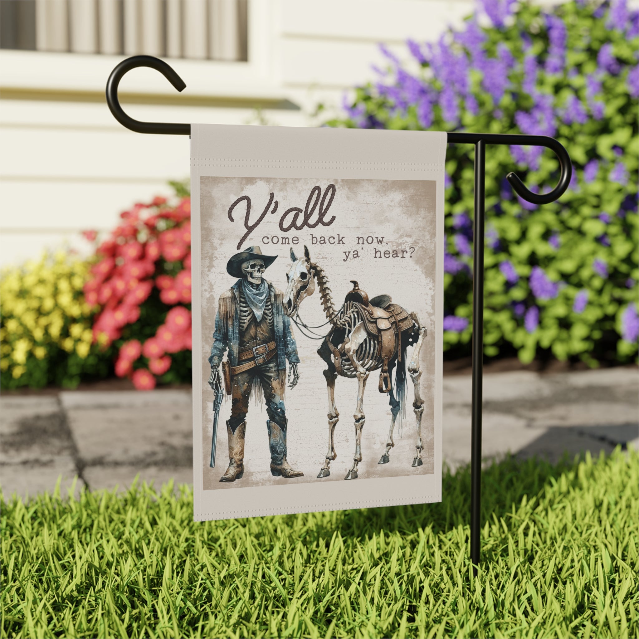 Close-up of Y'all Come Back Now skeleton garden flag with western design detail