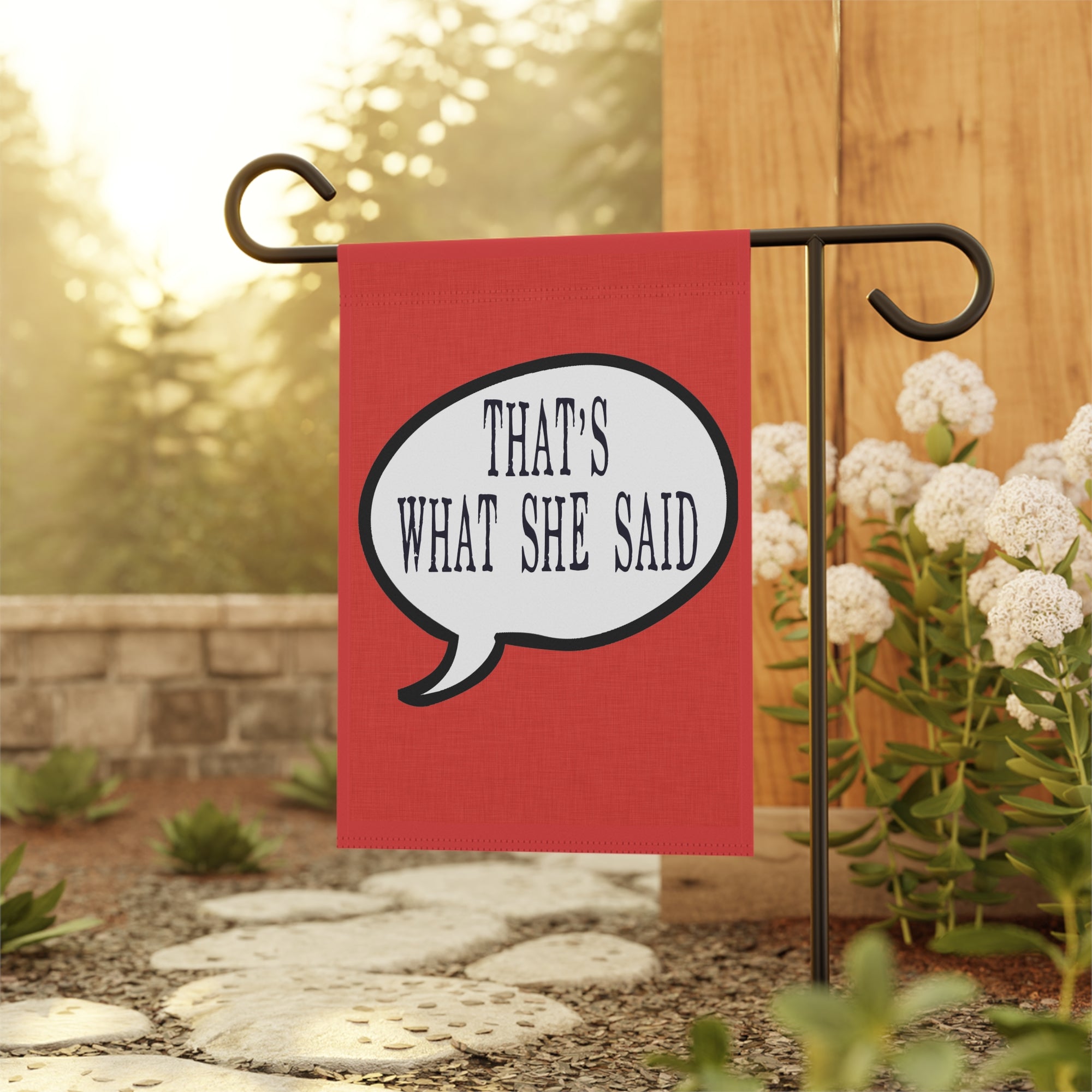 Sassy office humor garden flag displayed outdoors on a porch flag stand