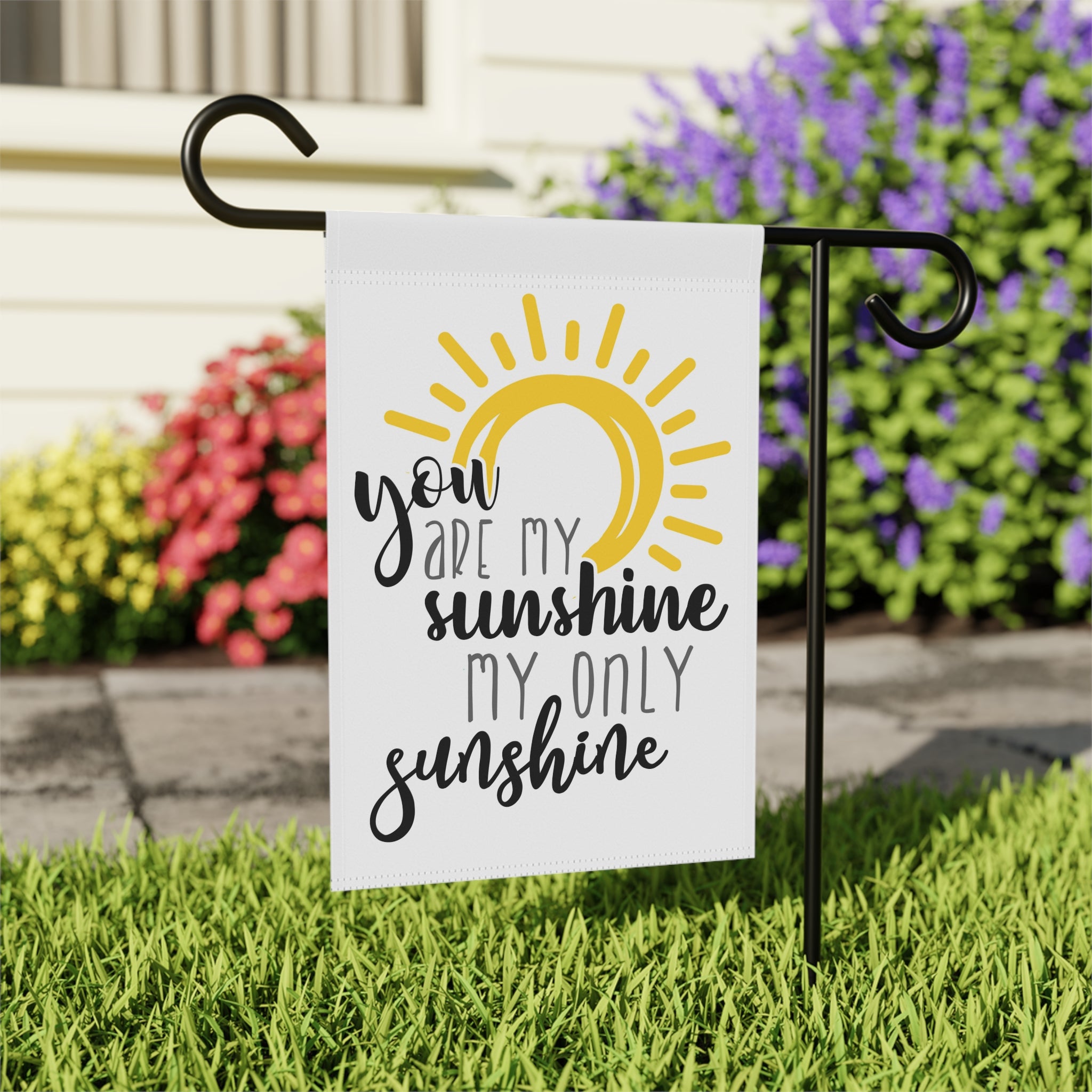 Close-up of You Are My Sunshine garden flag with happy sunshine typography detail