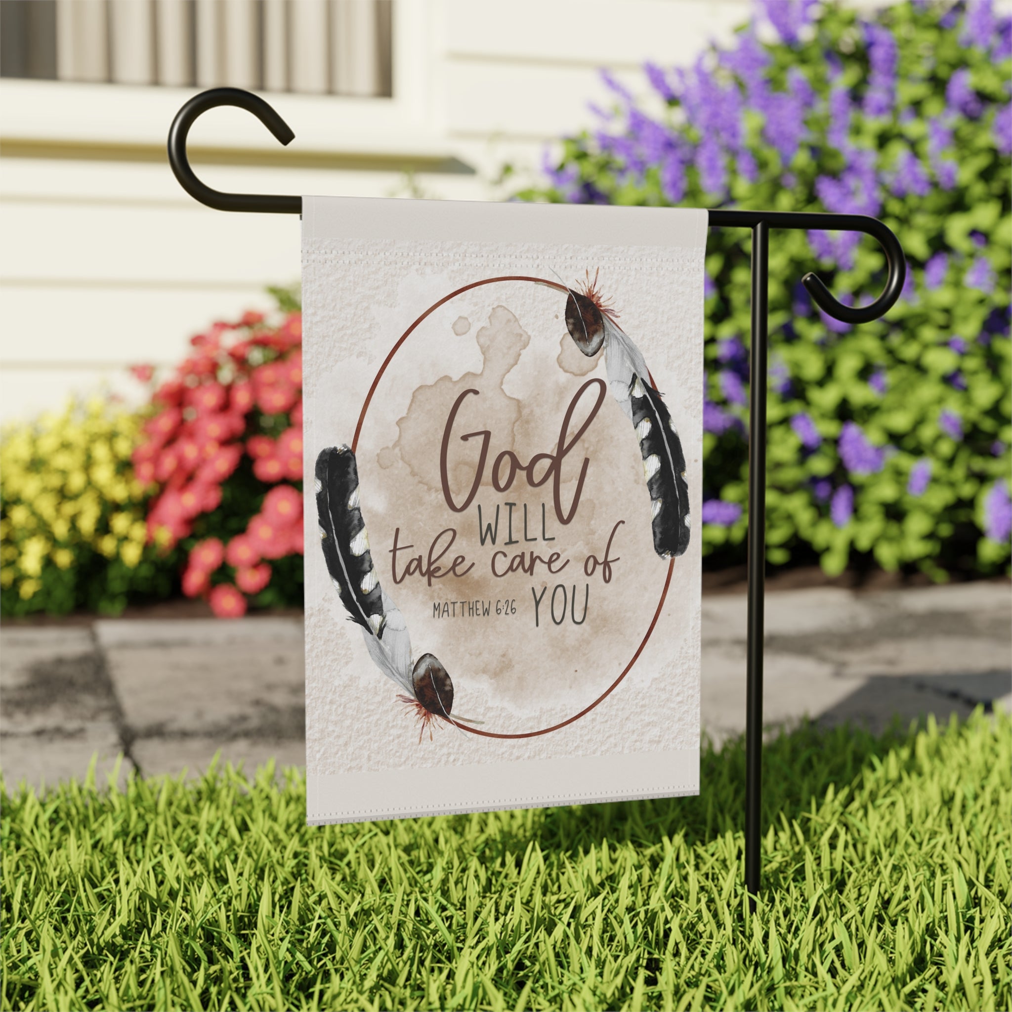 Close-up of God Will Take Care of You scripture garden flag with bird design