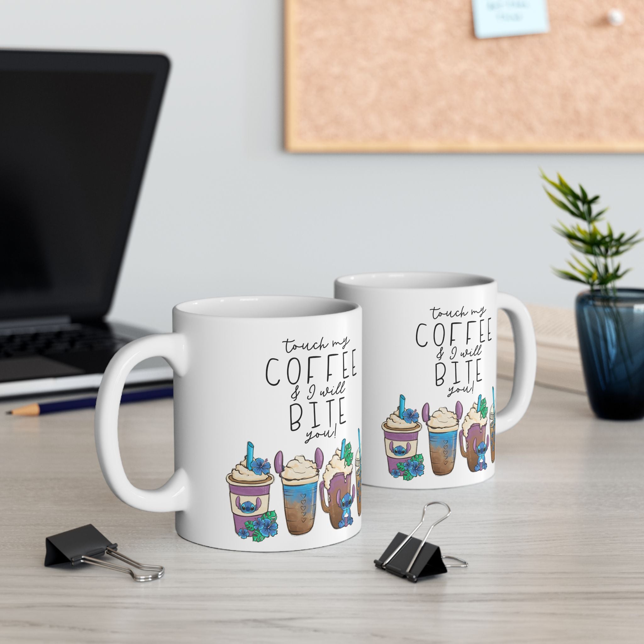 Two mugs with humorous coffee-themed text on a desk with office supplies.