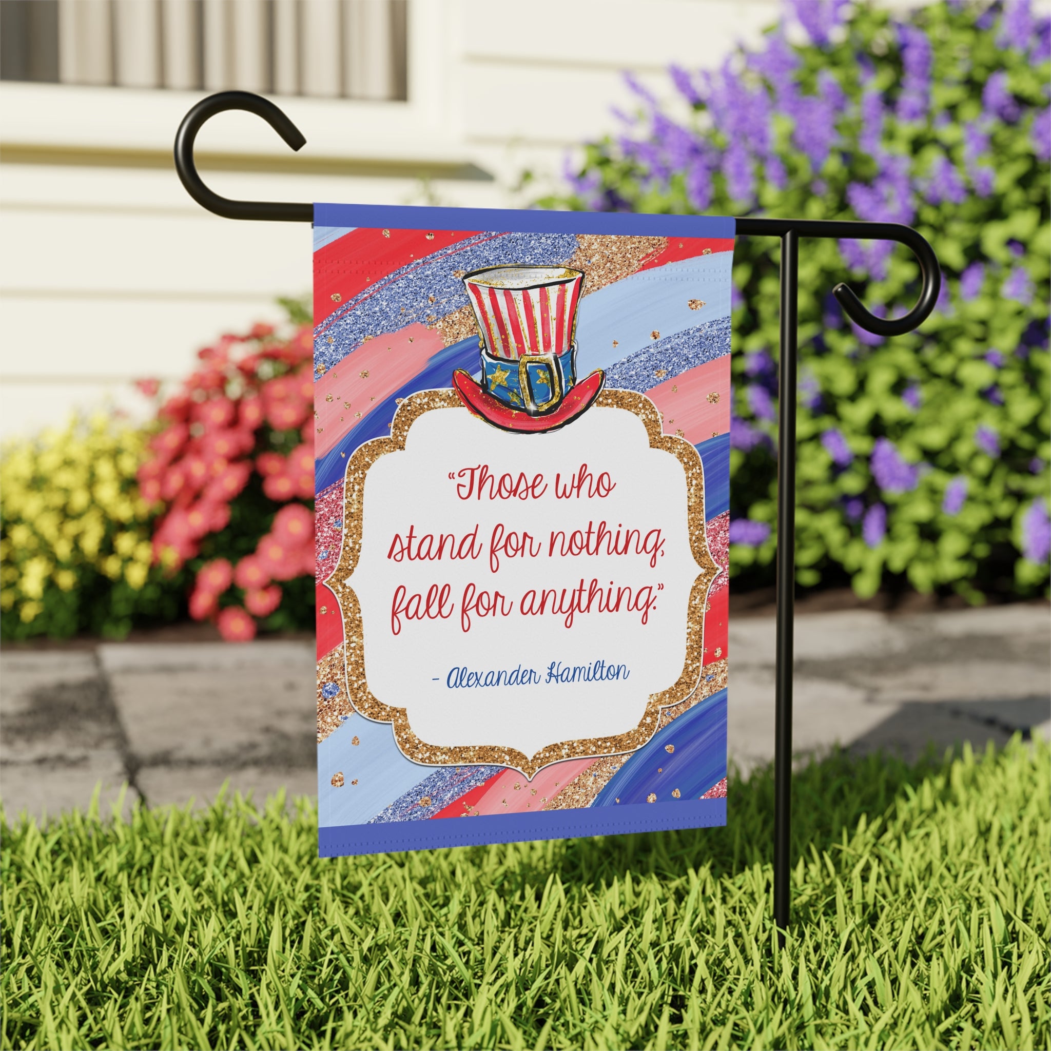 Close-up detail of Hamilton quote garden flag with vintage stars and stripes design