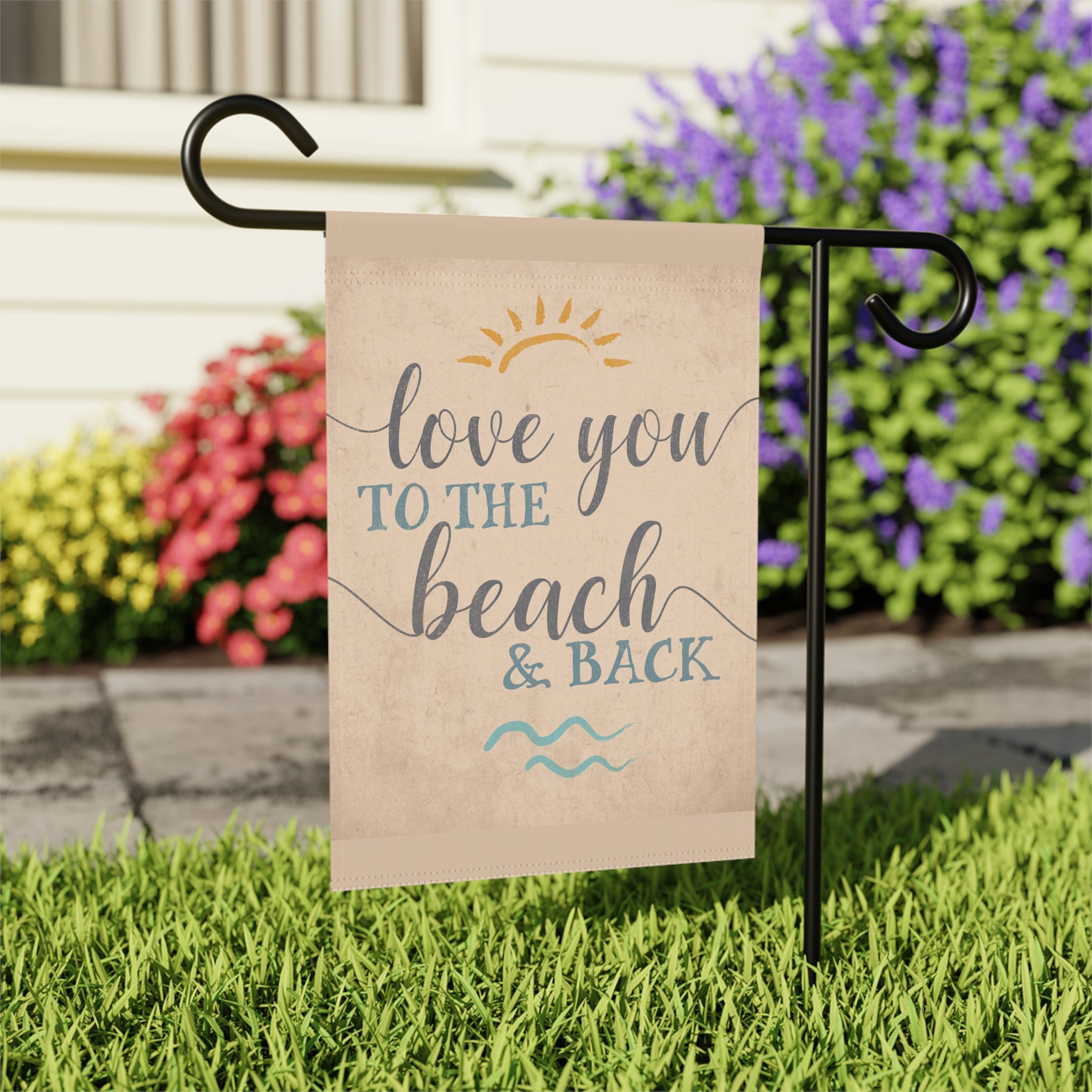 Close-up of Love You to the Beach and Back garden flag with hand-illustrated beach details