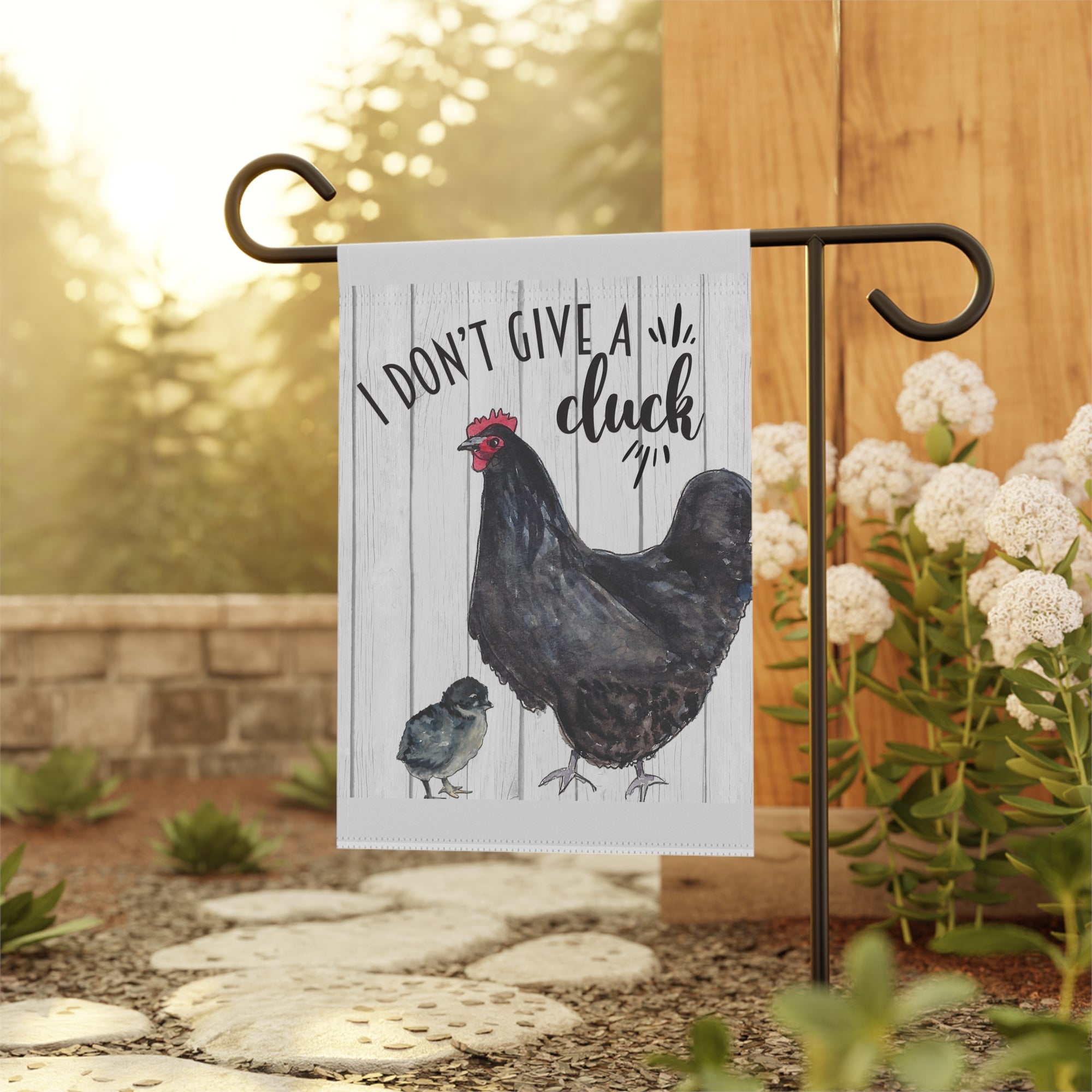 Sassy chicken farmhouse garden flag displayed outdoors on a porch flag stand