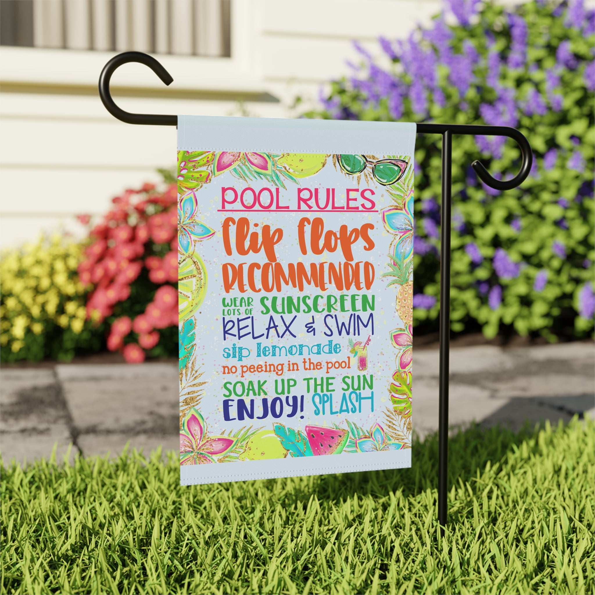 Close-up of Pool Rules garden flag with sassy pool design detail