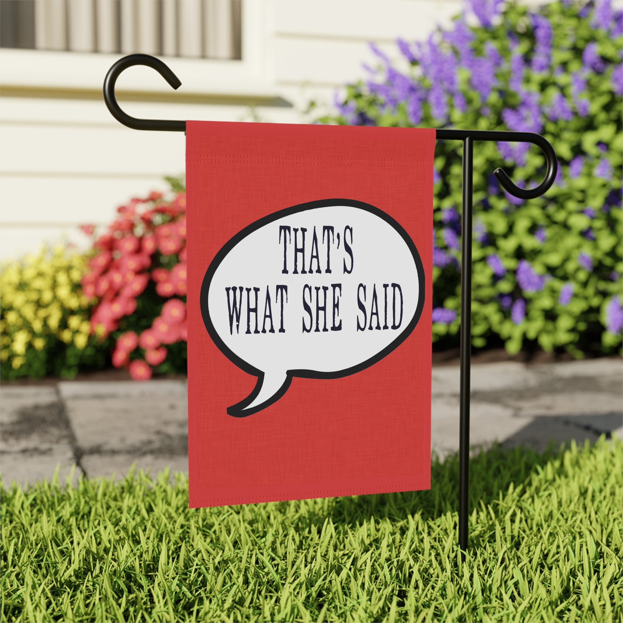 Close-up of That's What She Said garden flag with vintage typography