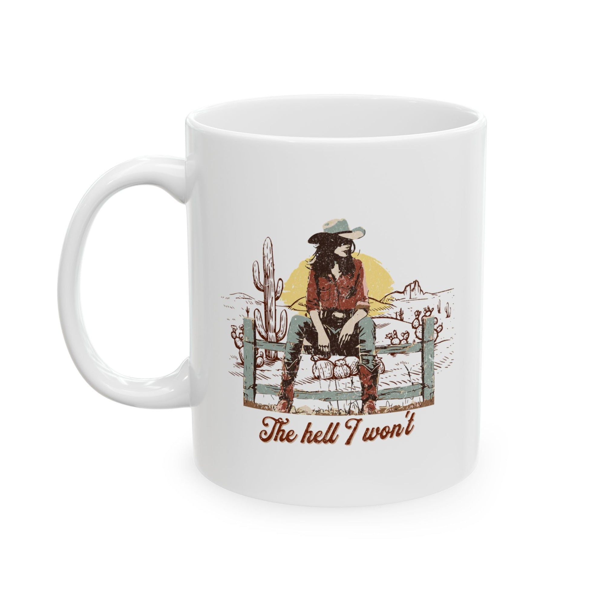 White mug with a graphic of a person in a cowboy hat and boots sitting on a fence with cacti, and text 'The hell I won't' on a white background.