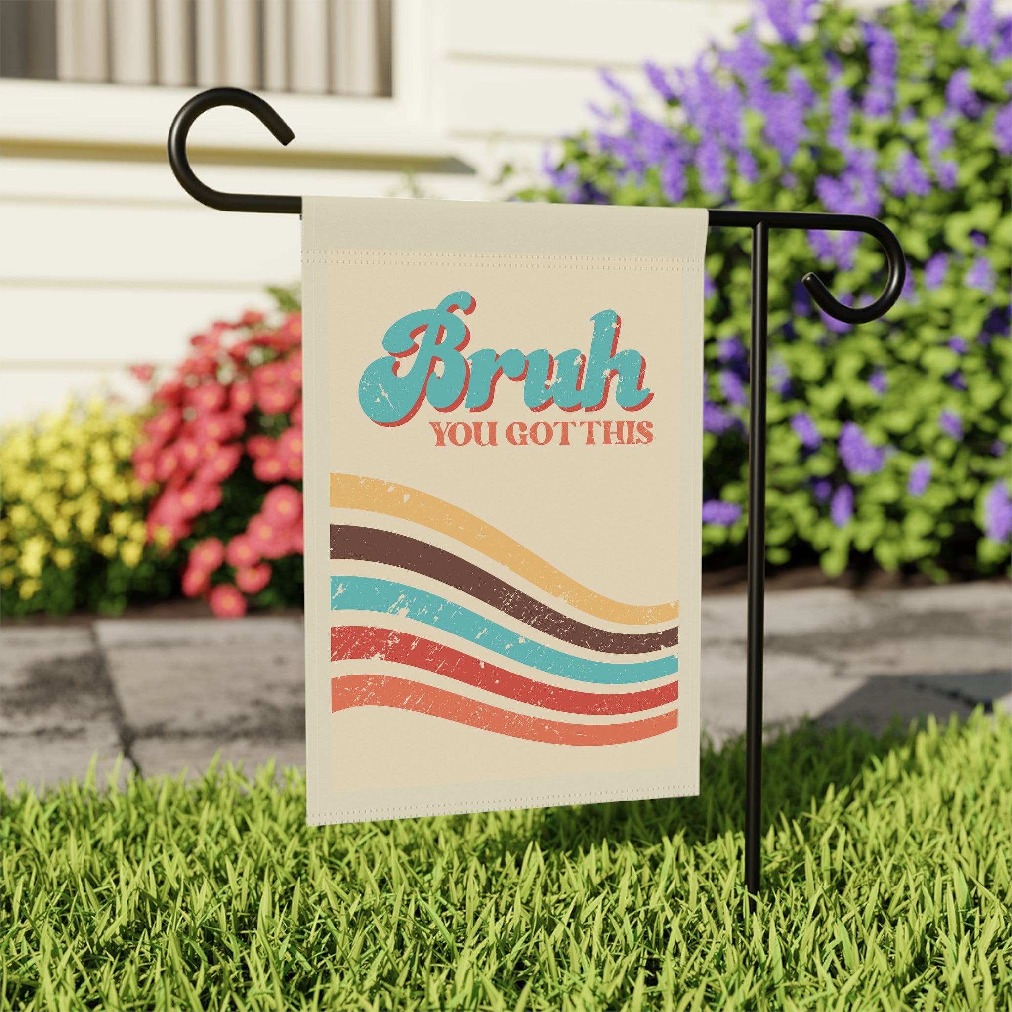 Close-up of Bruh You Got This garden flag with retro typography detail