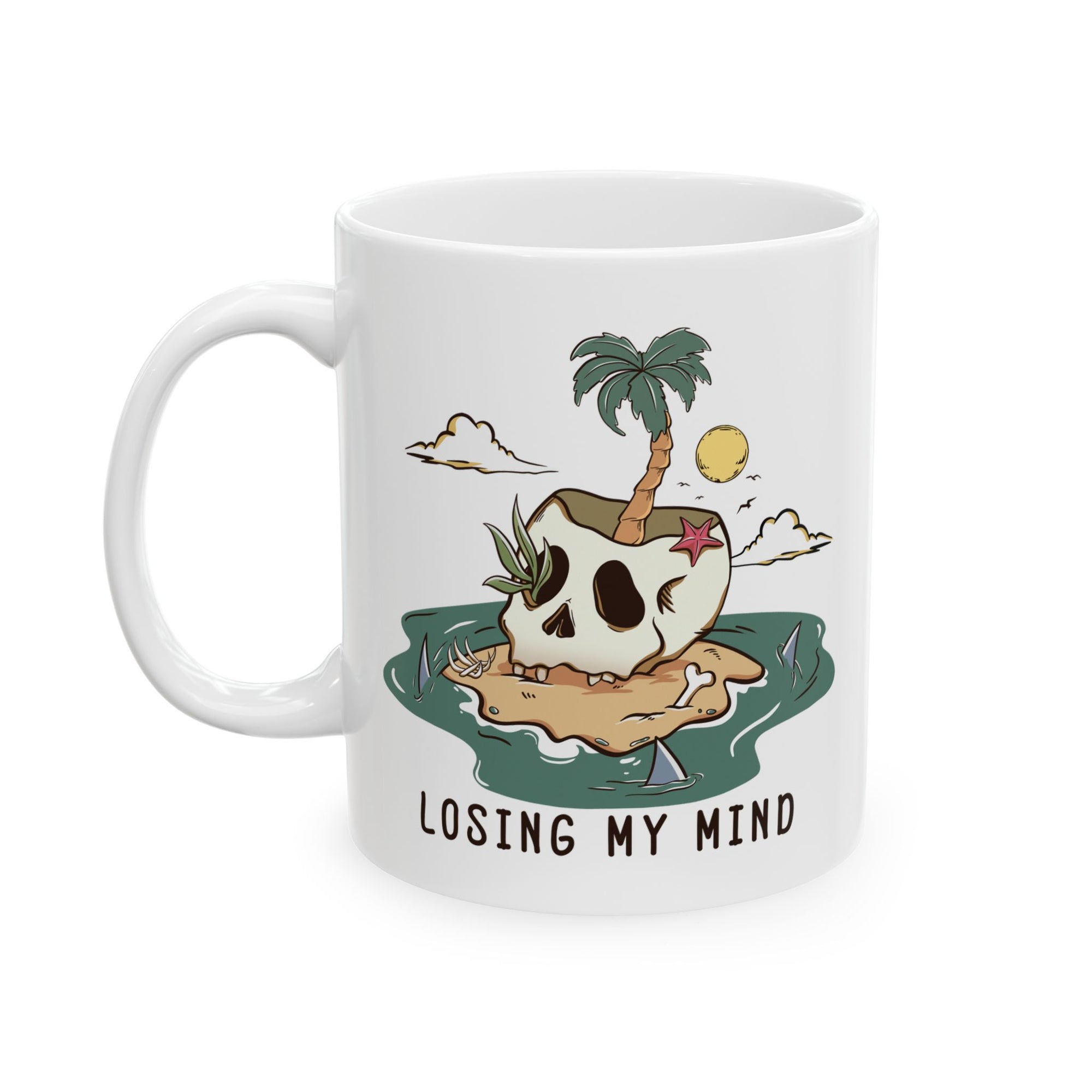 White mug with a skull and palm tree design and 'Losing My Mind' text on a white background