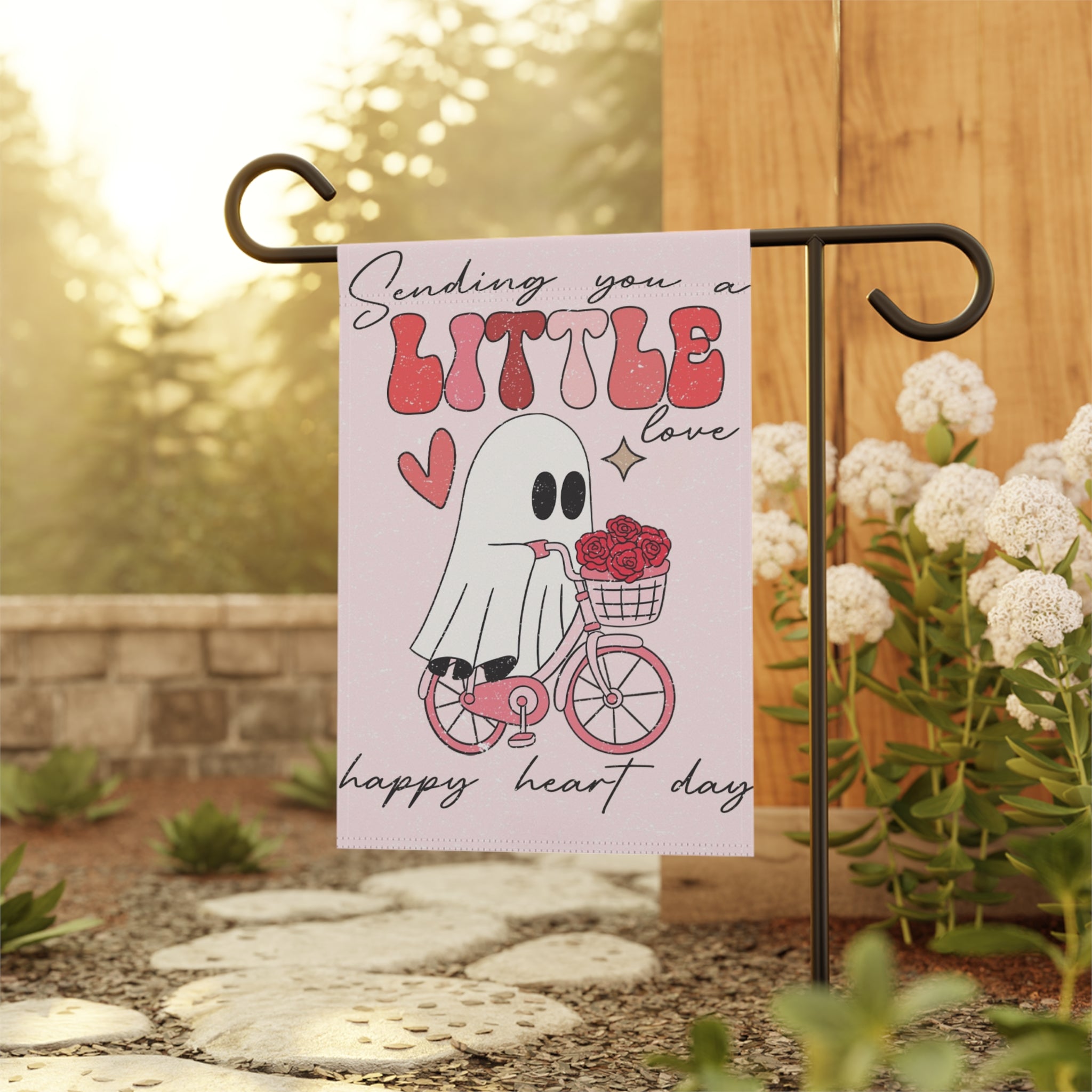 Close-up of Valentine ghost garden flag with hand-drawn heart and 'Happy Heart Day' text