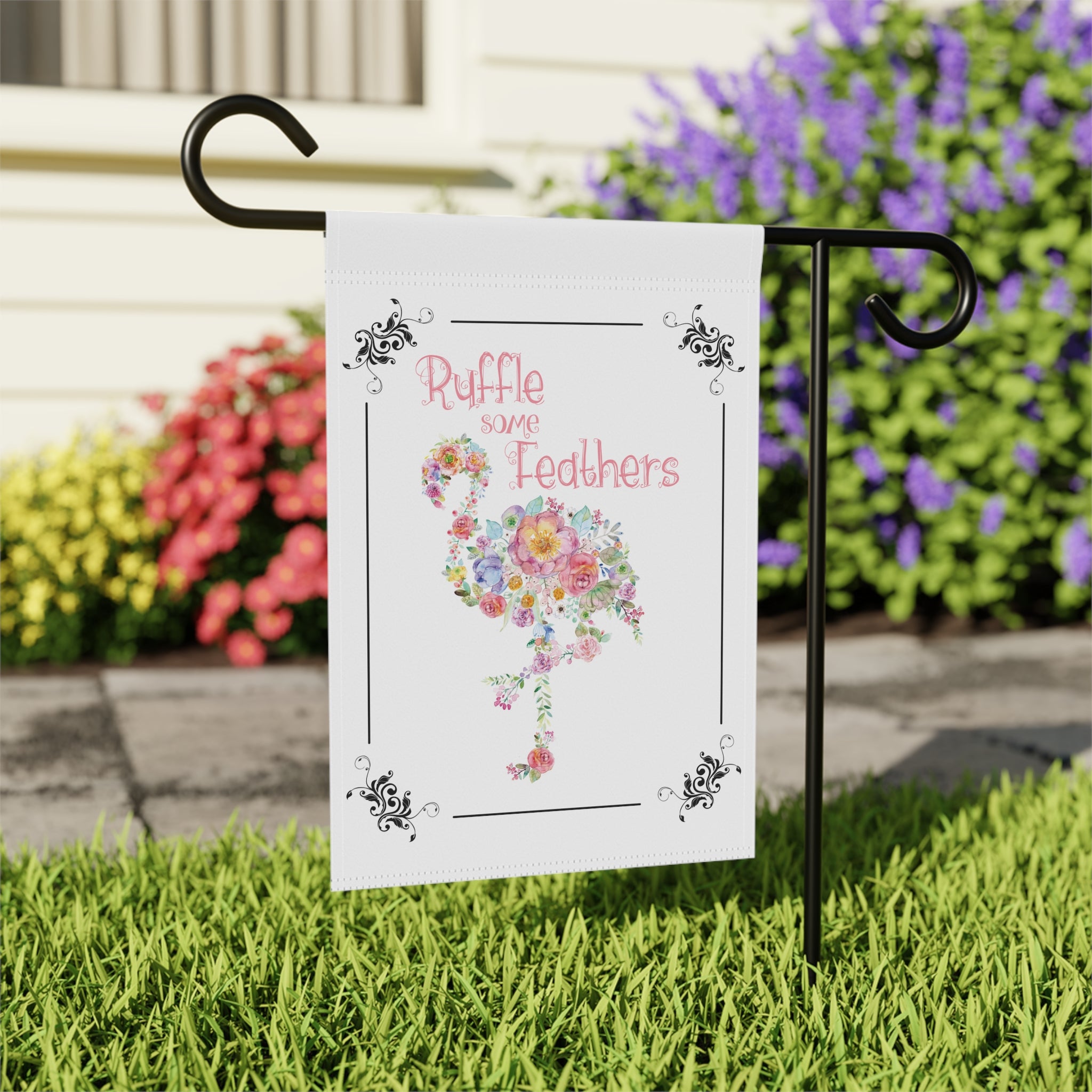 Close-up of Ruffle Some Feathers flamingo garden flag with hand-illustrated flamingo and florals