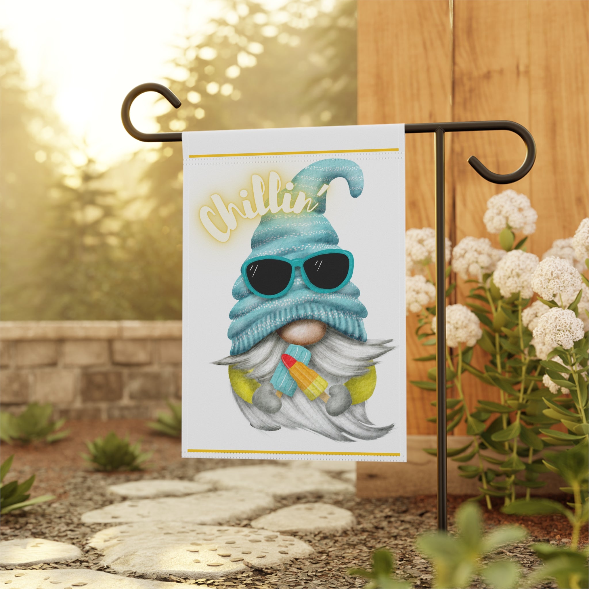 Cute popsicle gnome garden flag displayed outdoors on a porch flag stand