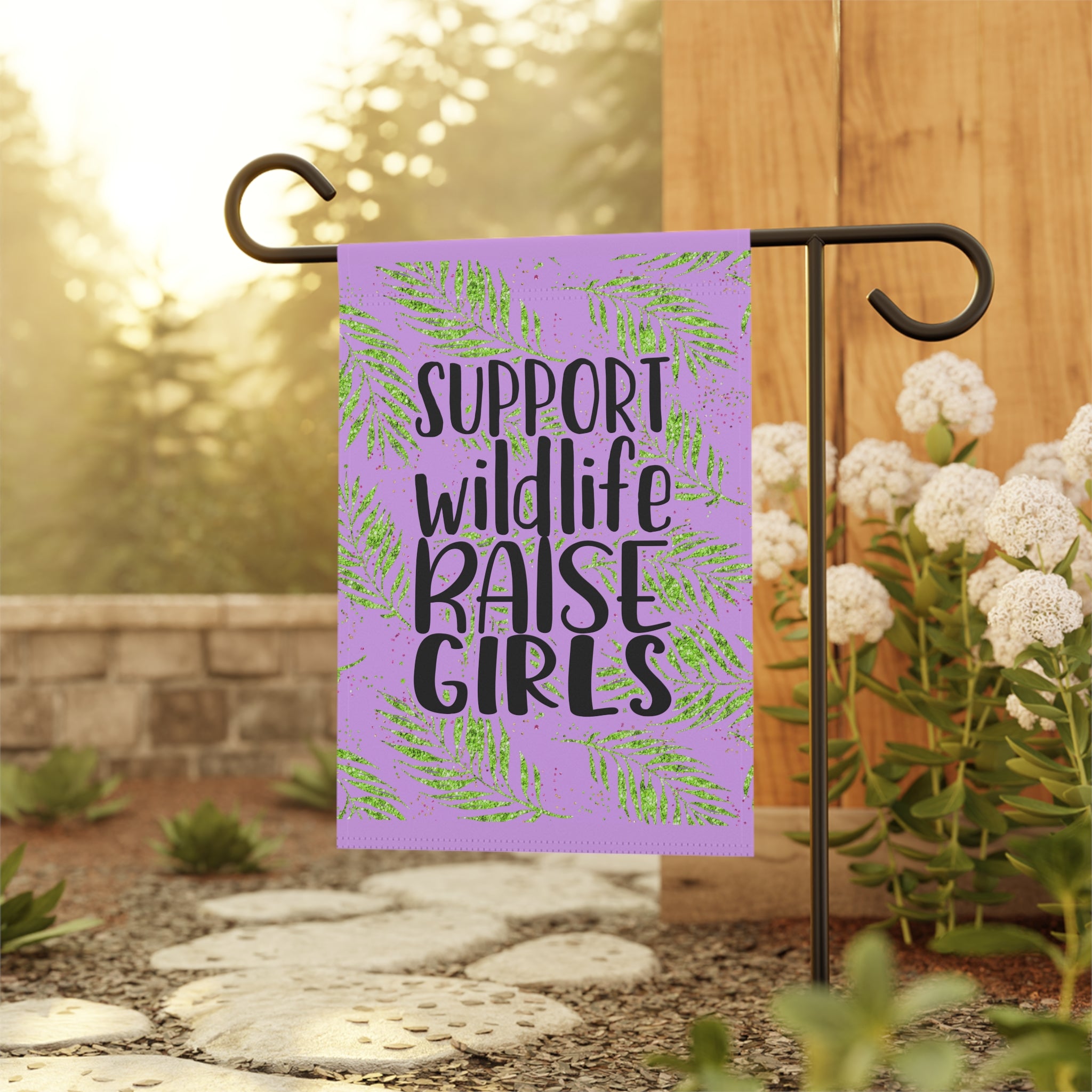 Girl mom empowerment garden flag displayed outdoors on a porch flag stand
