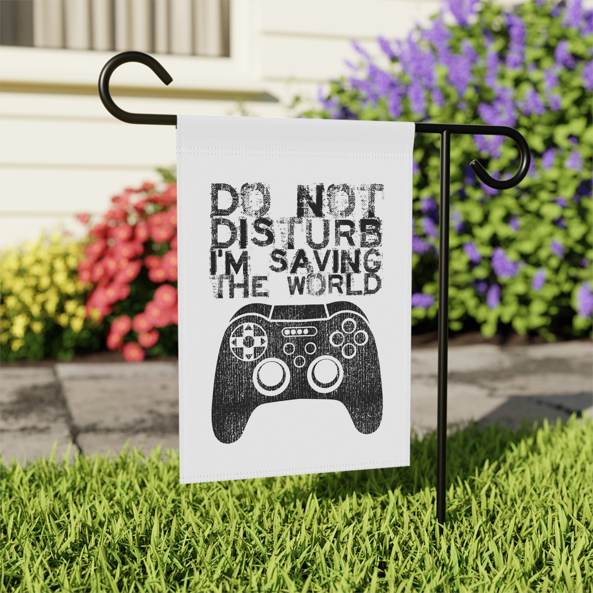 Close-up of Do Not Disturb I'm Saving The World gamer garden flag with retro design detail