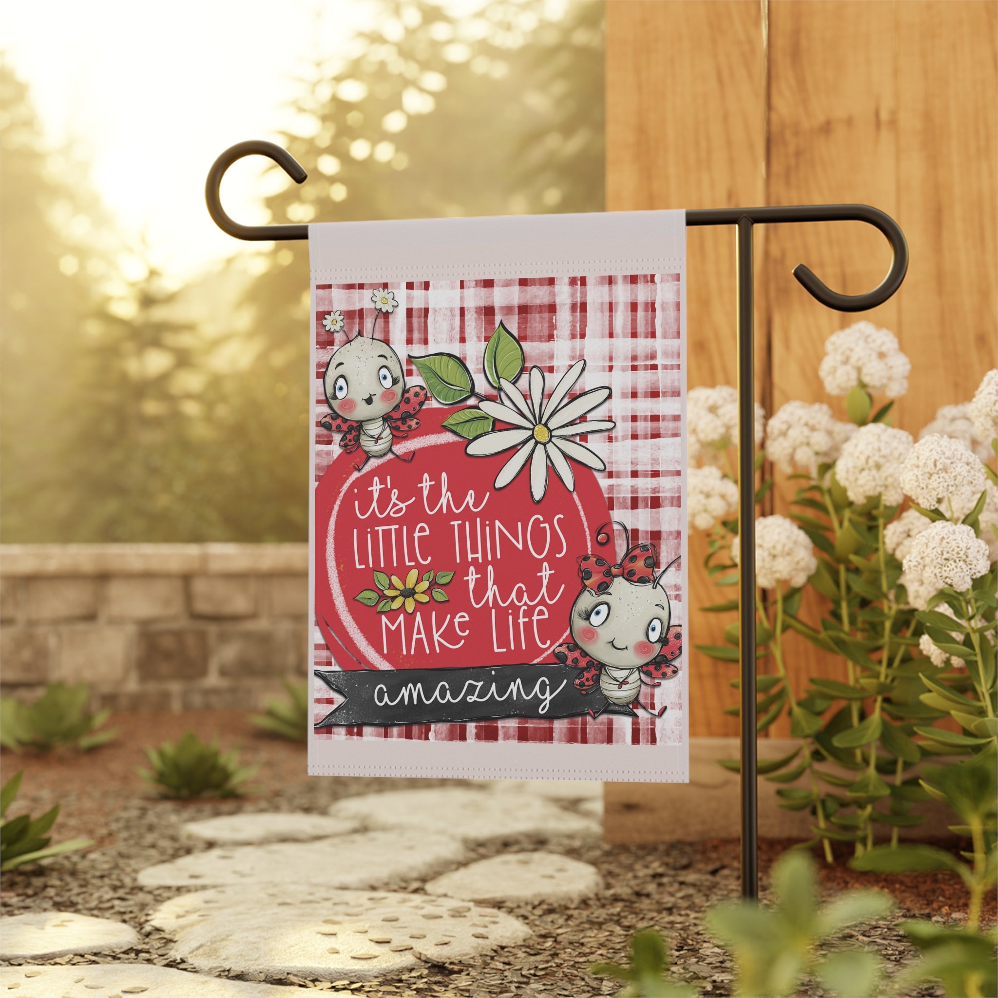 Cute ladybug cottagecore garden flag displayed outdoors on a porch flag stand