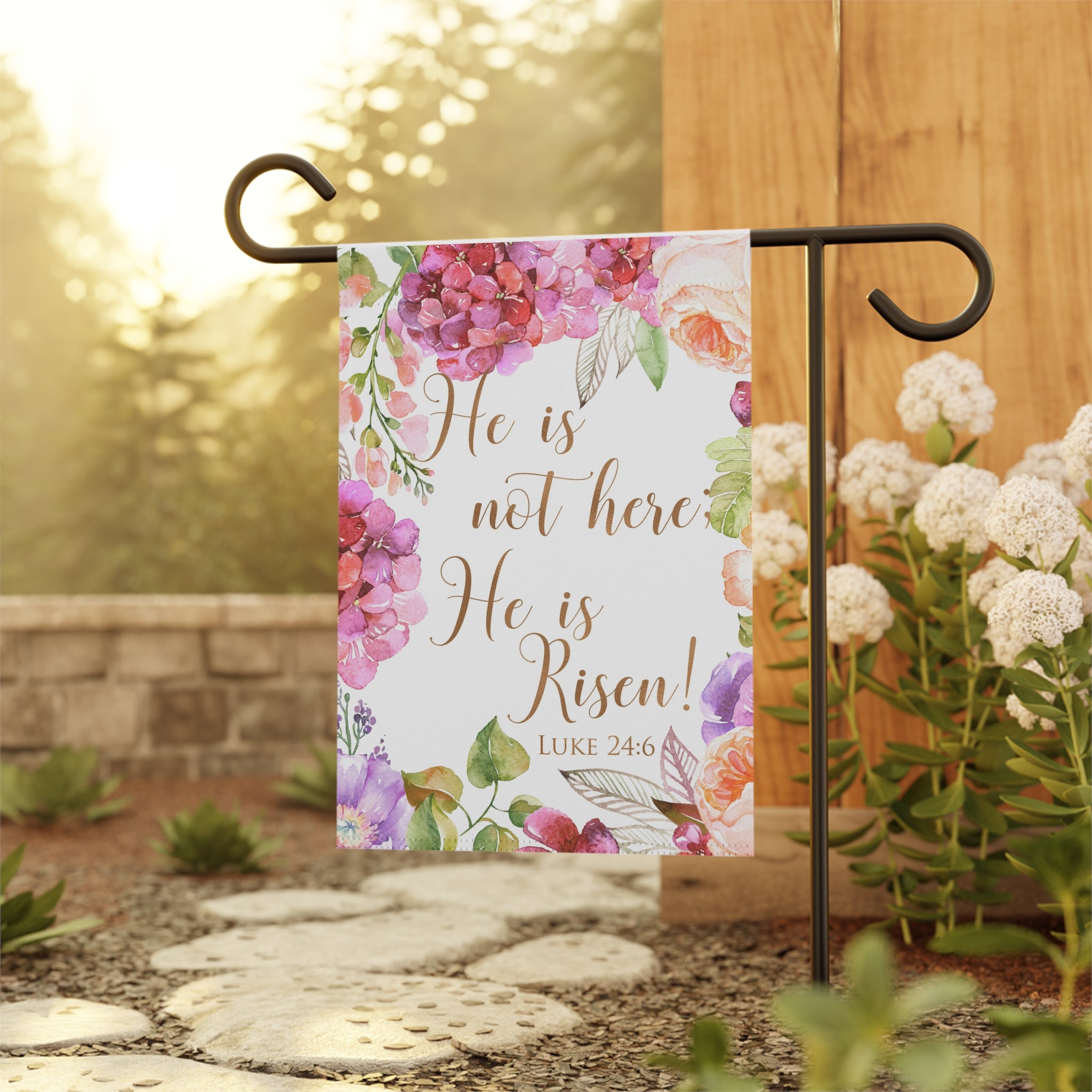 Close-up of He Is Risen Luke 24:6 Easter Christian garden banner with watercolor florals