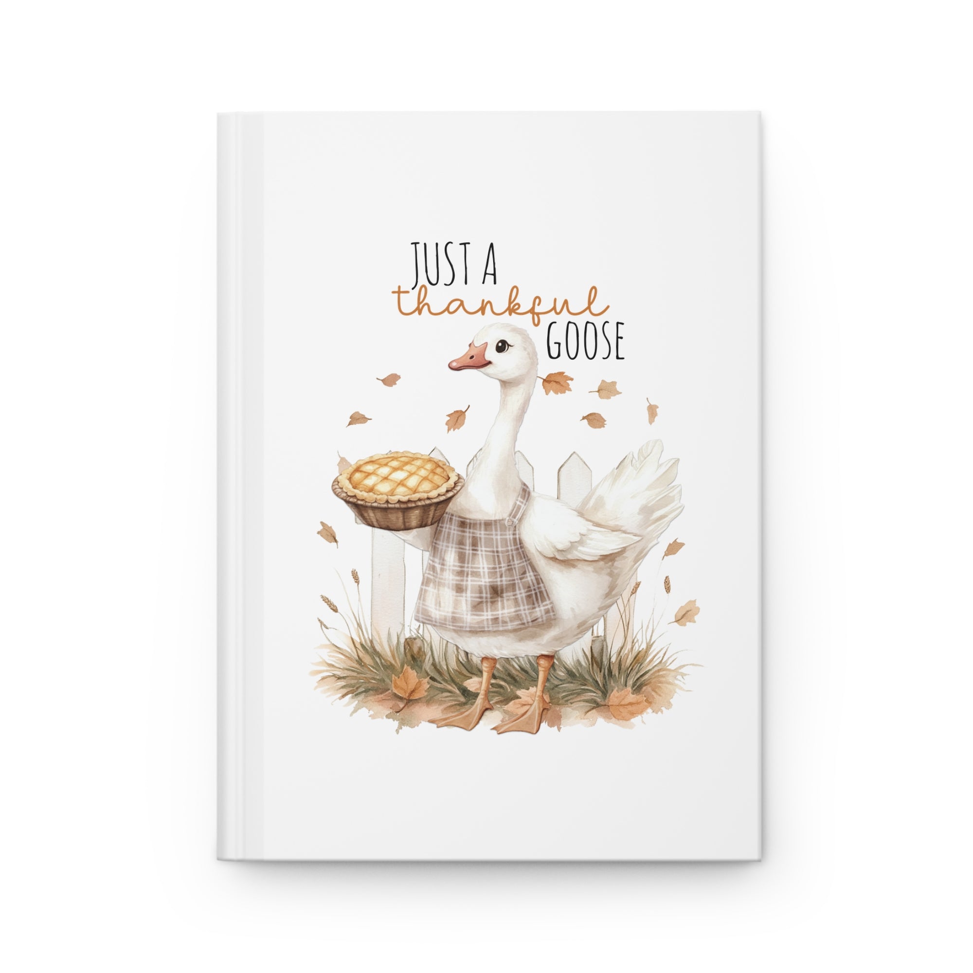 Notebook with a goose illustration and 'Just a thankful goose' text on a white background