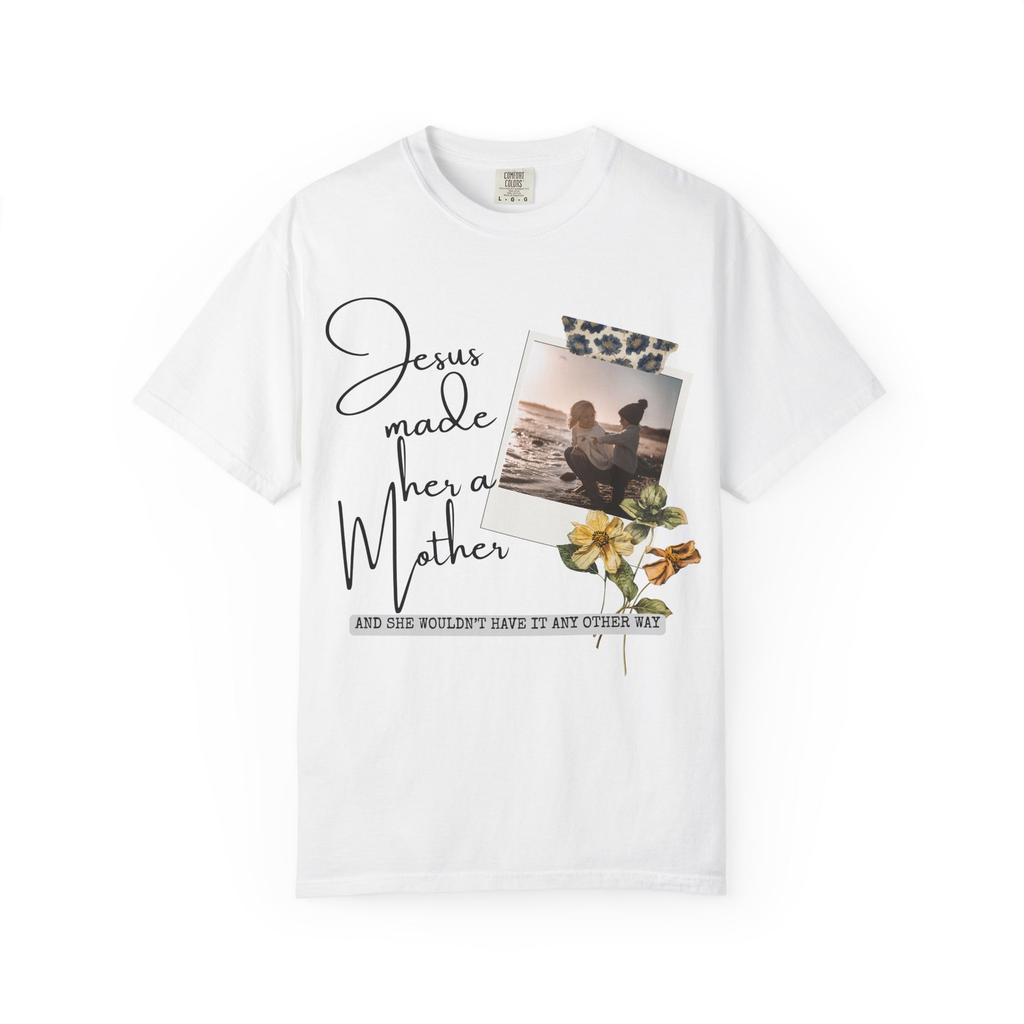 White t-shirt with printed design featuring text and a photo of a couple by a beach.