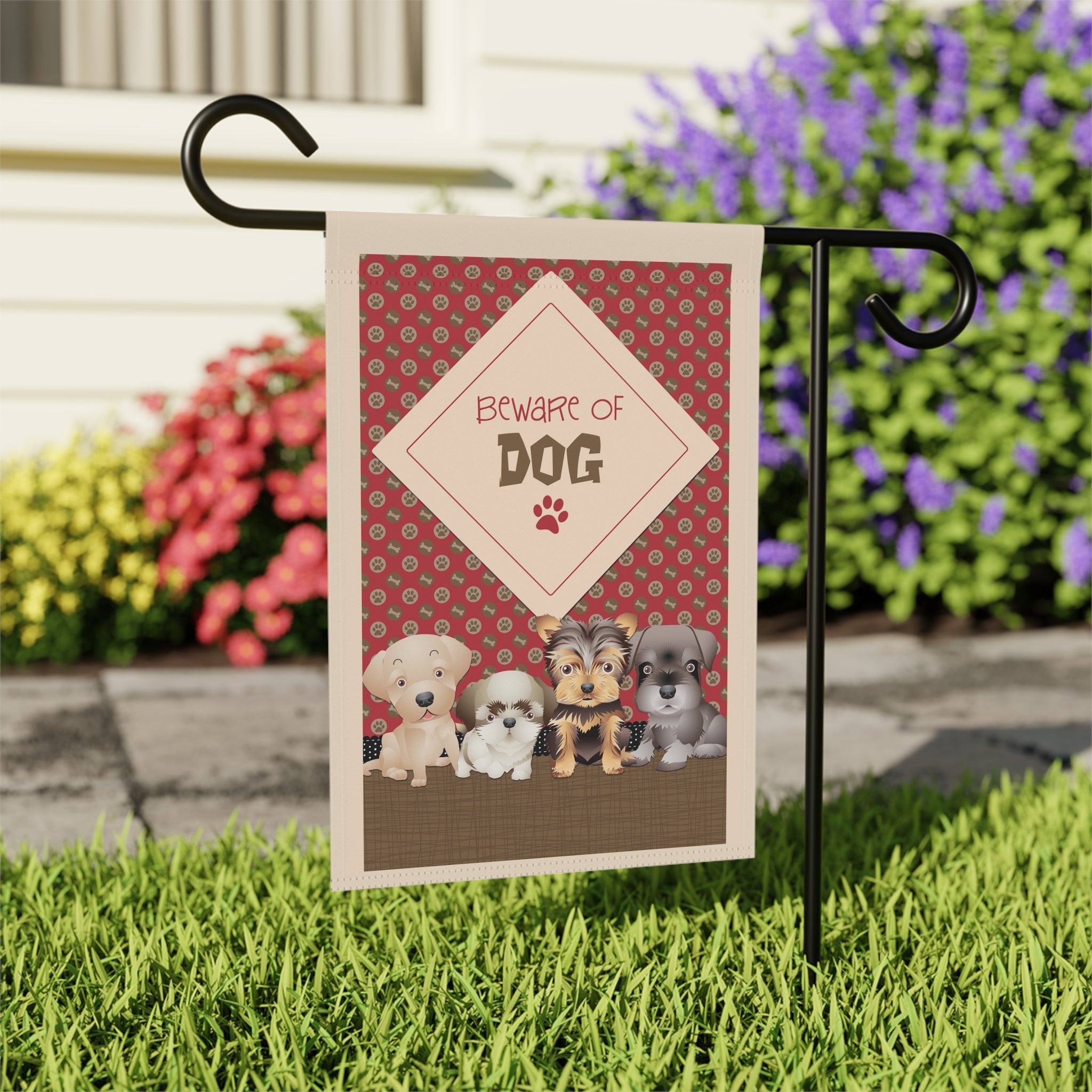 Close-up of Beware of Dog watercolor garden flag with paw print detail