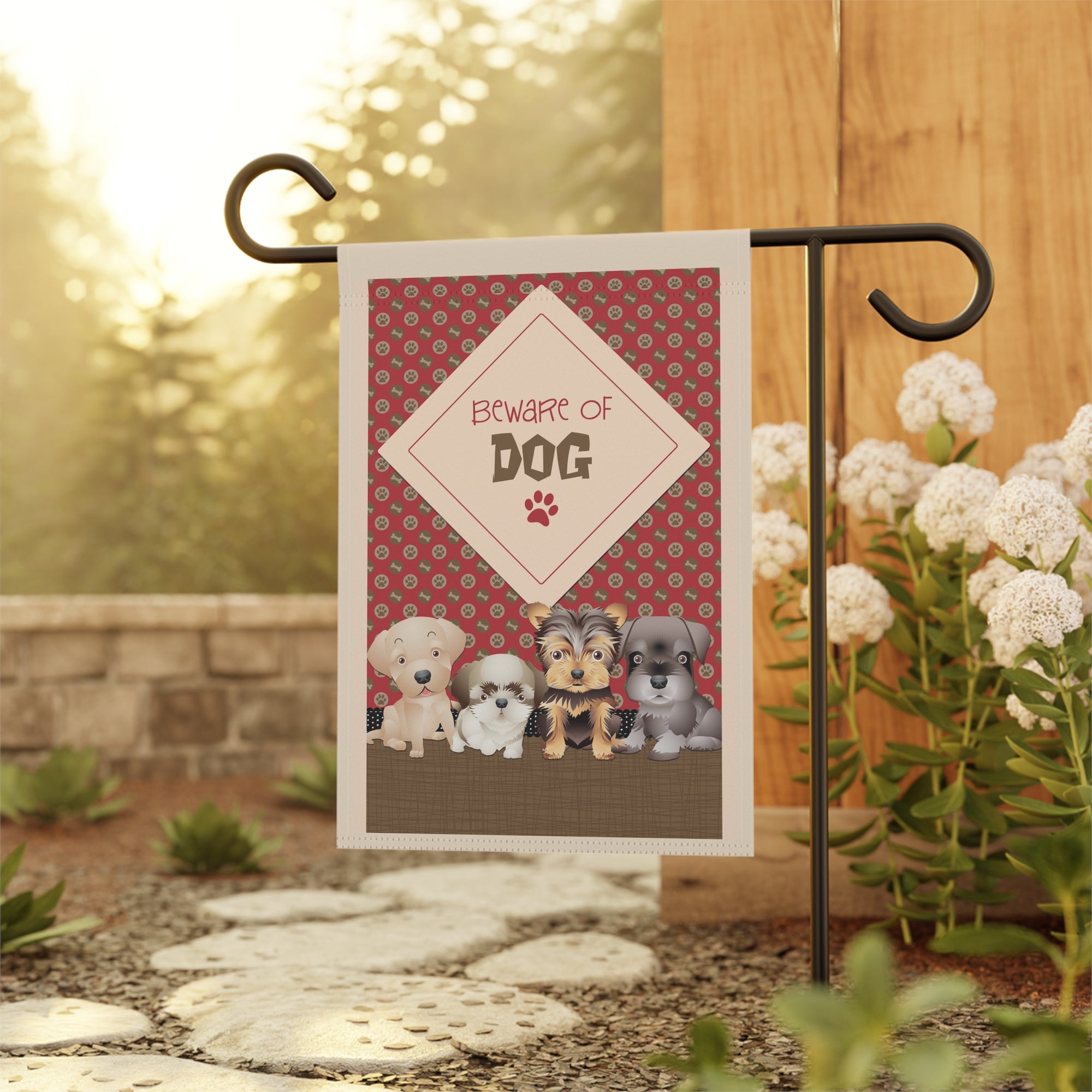 Cute Beware of Dog garden flag displayed outdoors on a flag stand