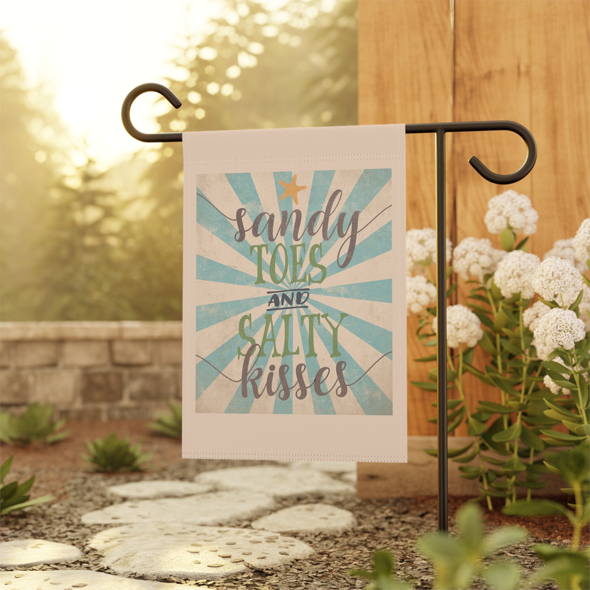 Romantic retro beach garden flag displayed outdoors at a coastal porch