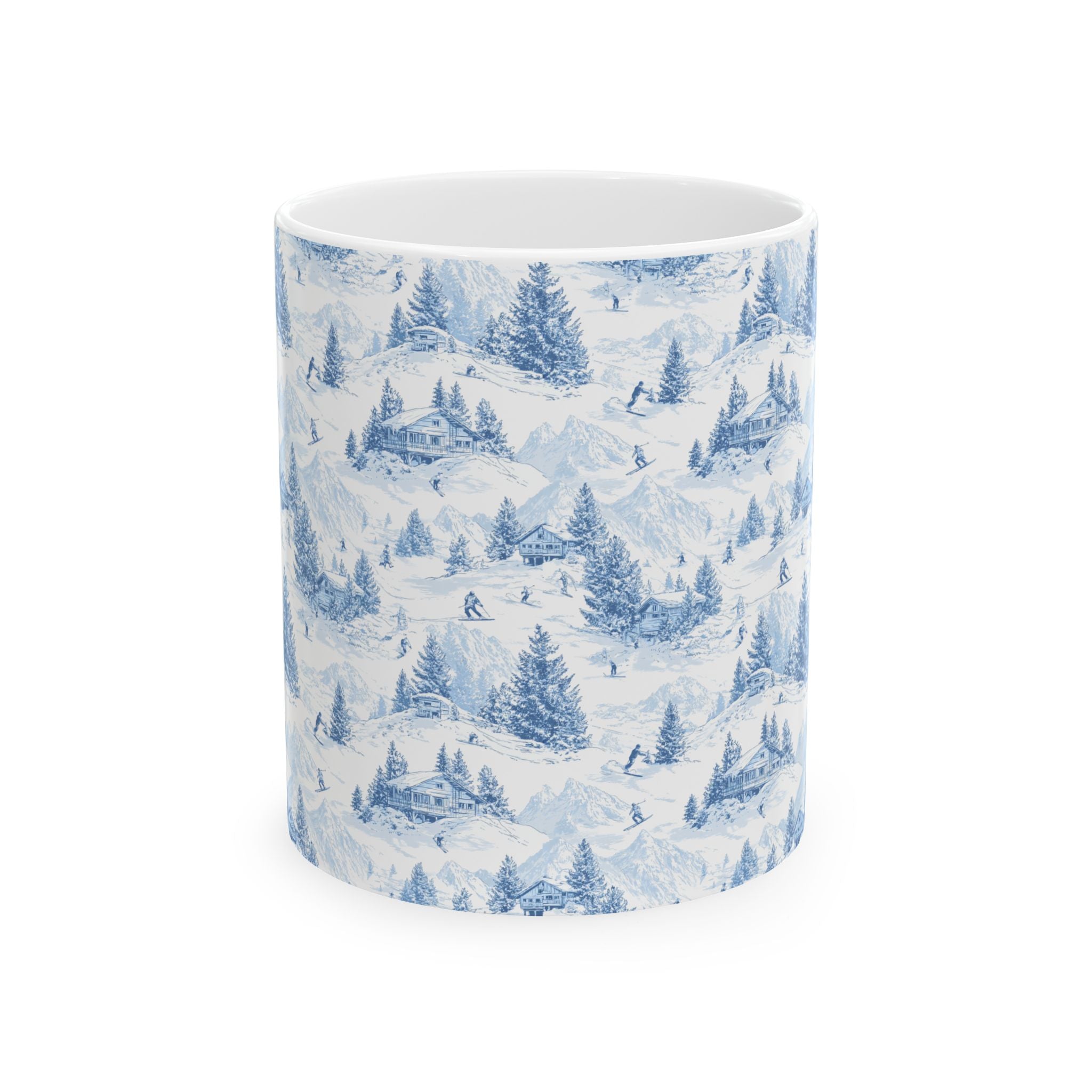 Ceramic mug with a blue winter landscape pattern on a white background