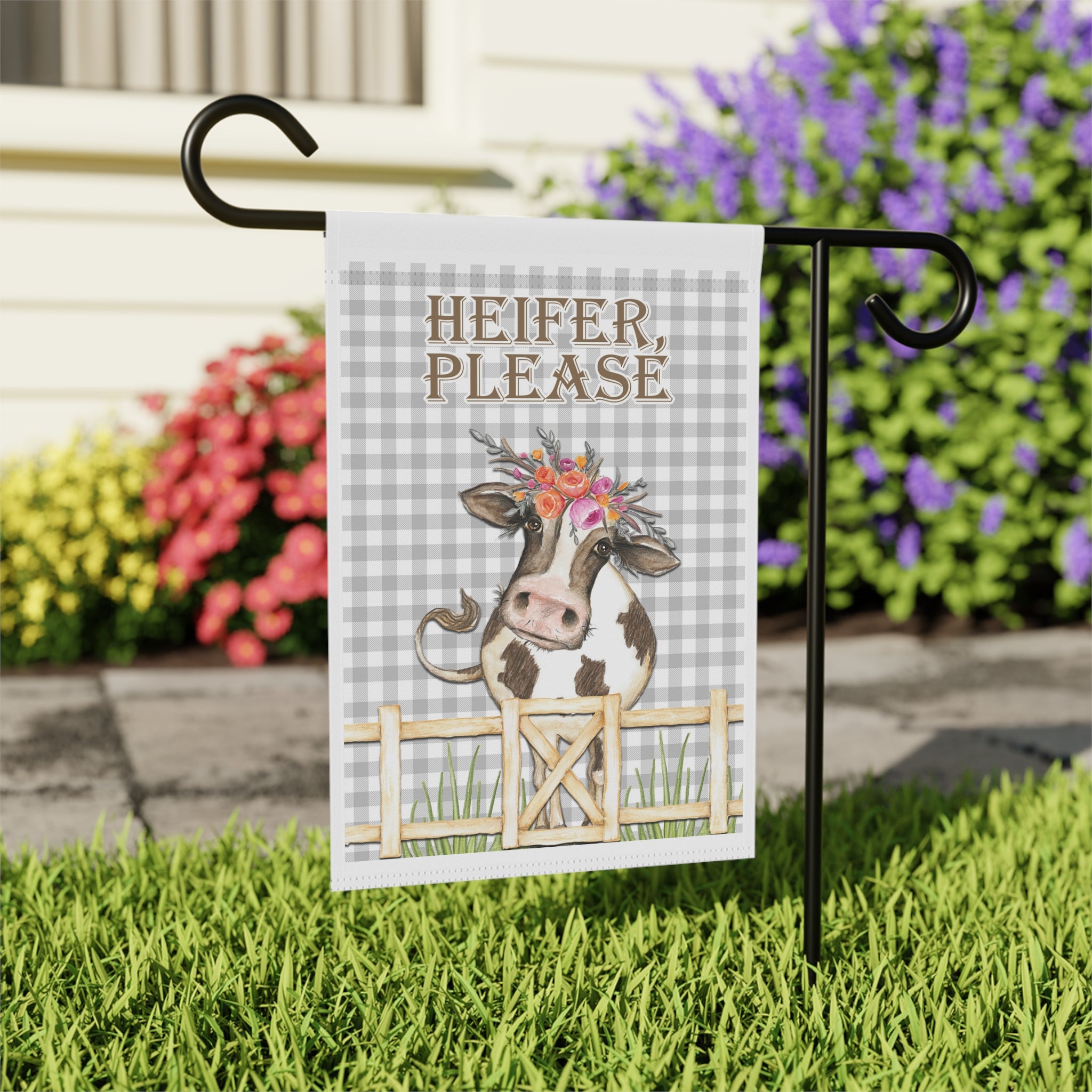 Close-up of Heifer Please cow garden flag with watercolor floral detail