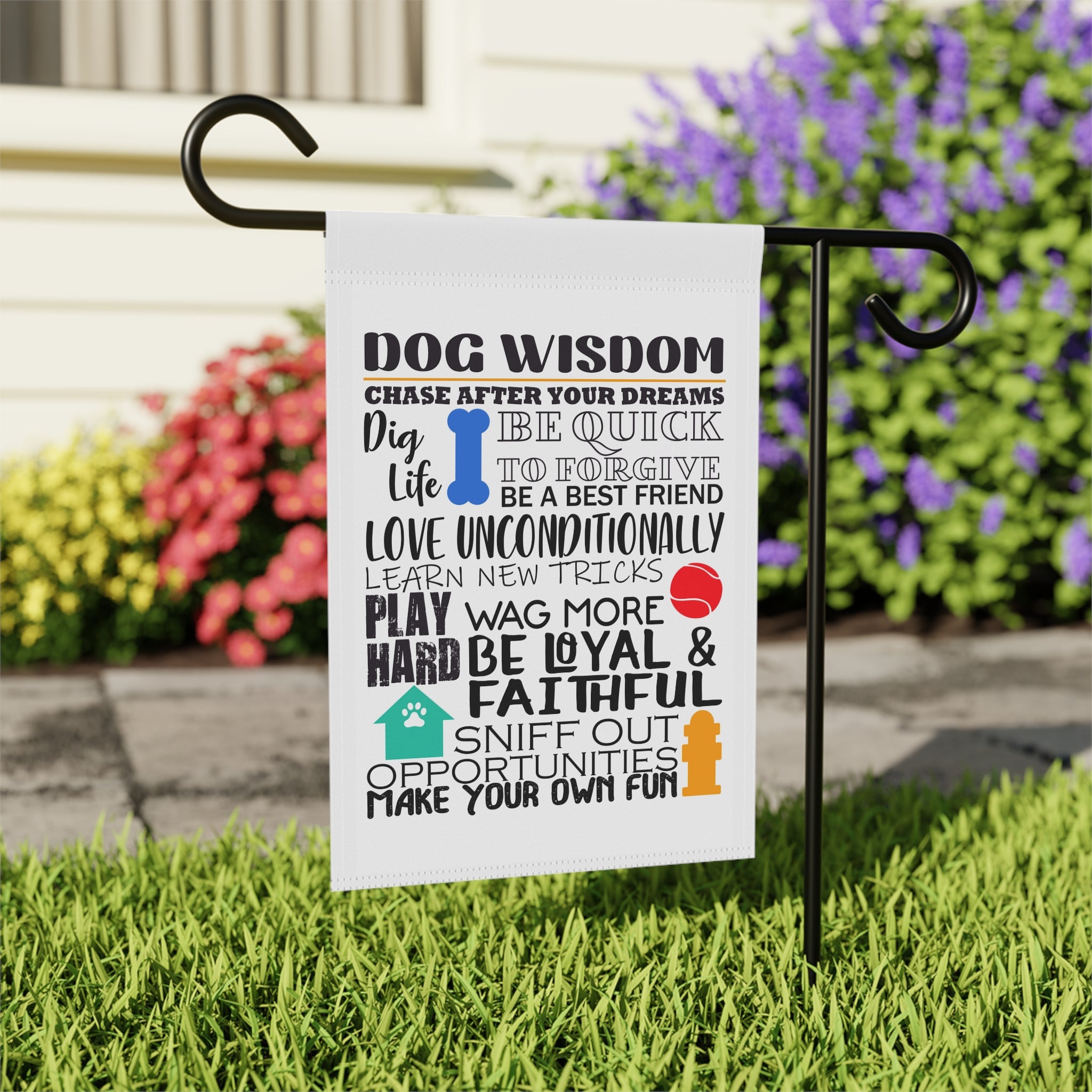 Close-up of Dog Wisdom Chase Dreams garden flag with cheerful bright design detail