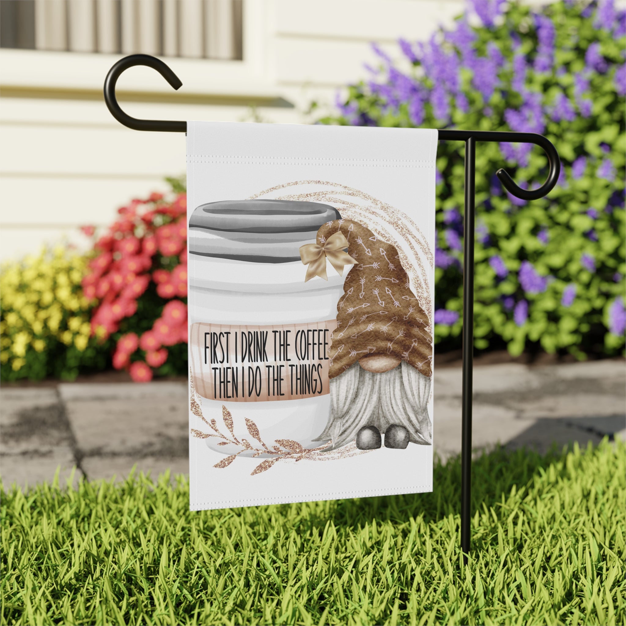 Close-up of First I Drink The Coffee Gnome garden flag with whimsical design detail