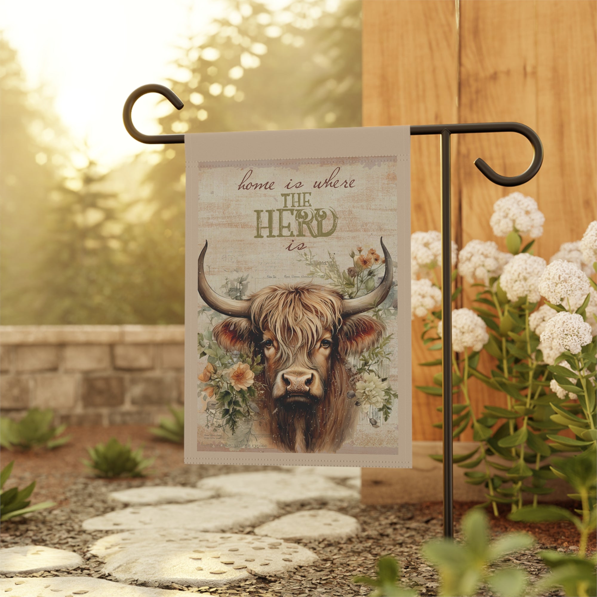 Highland cow farmhouse garden flag displayed outdoors on a flag stand