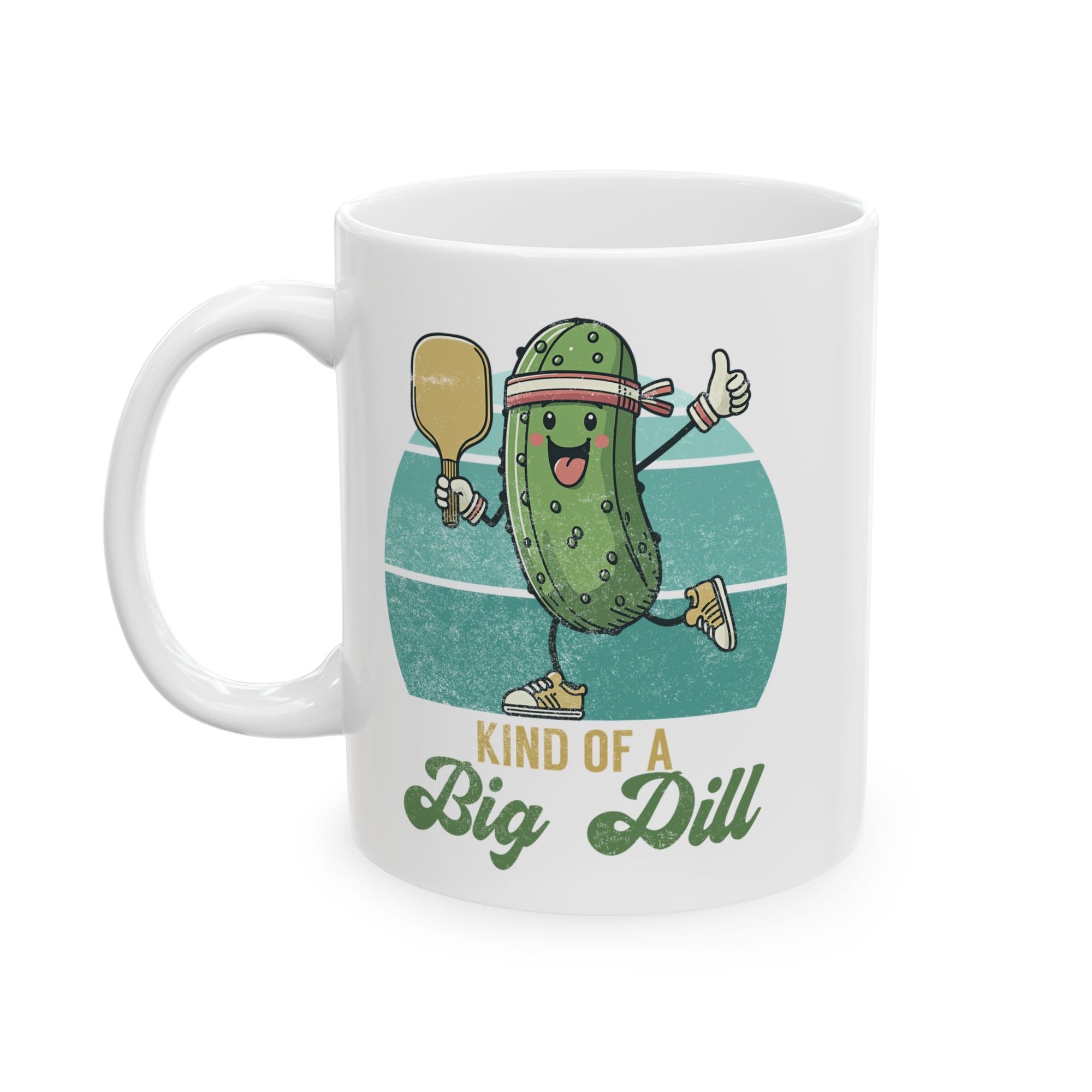 White mug with a pickle character holding a tennis racket and the text 'Kind of a Big Dill' on a white background