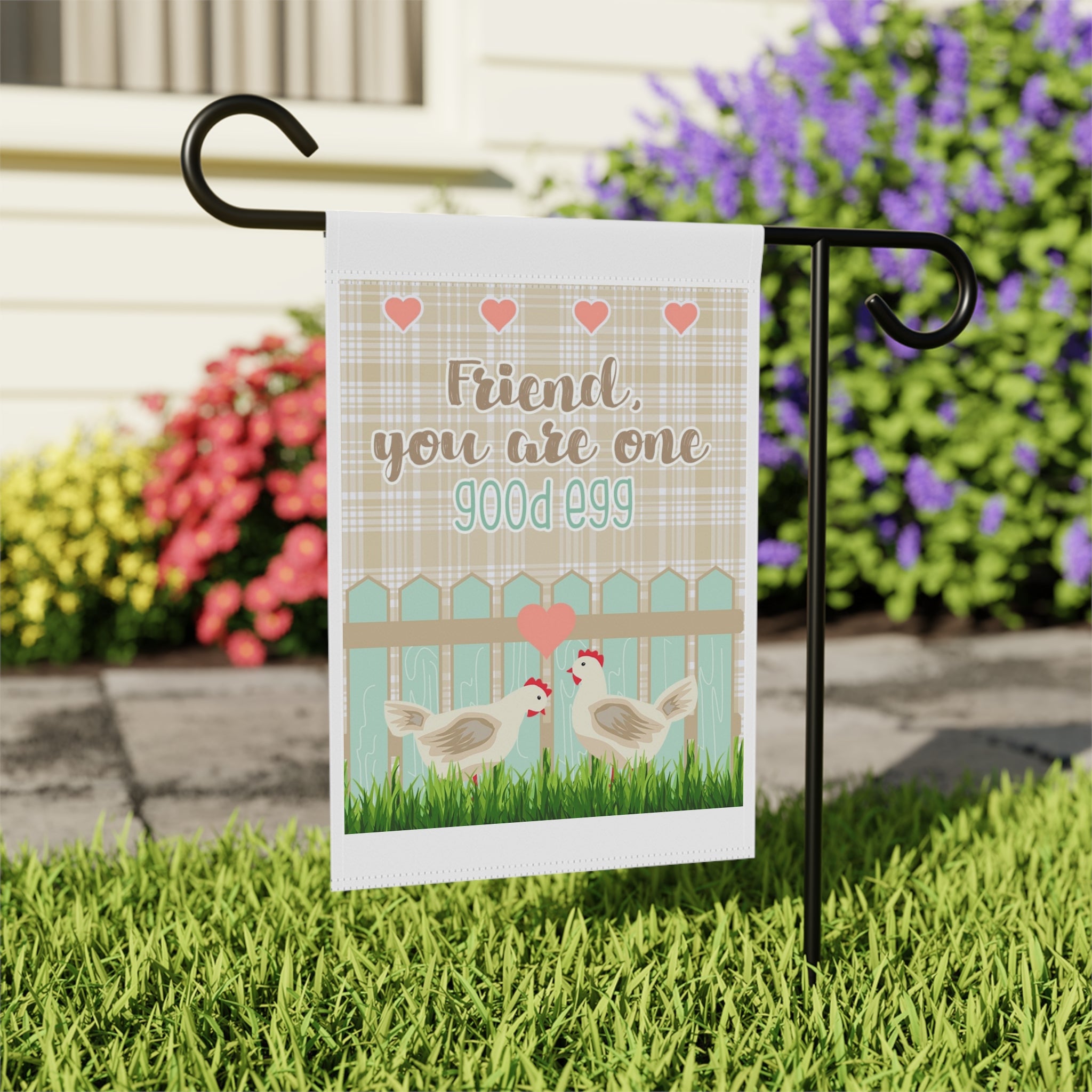 Close-up of Friend You Are One Good Egg garden flag with chicken design detail