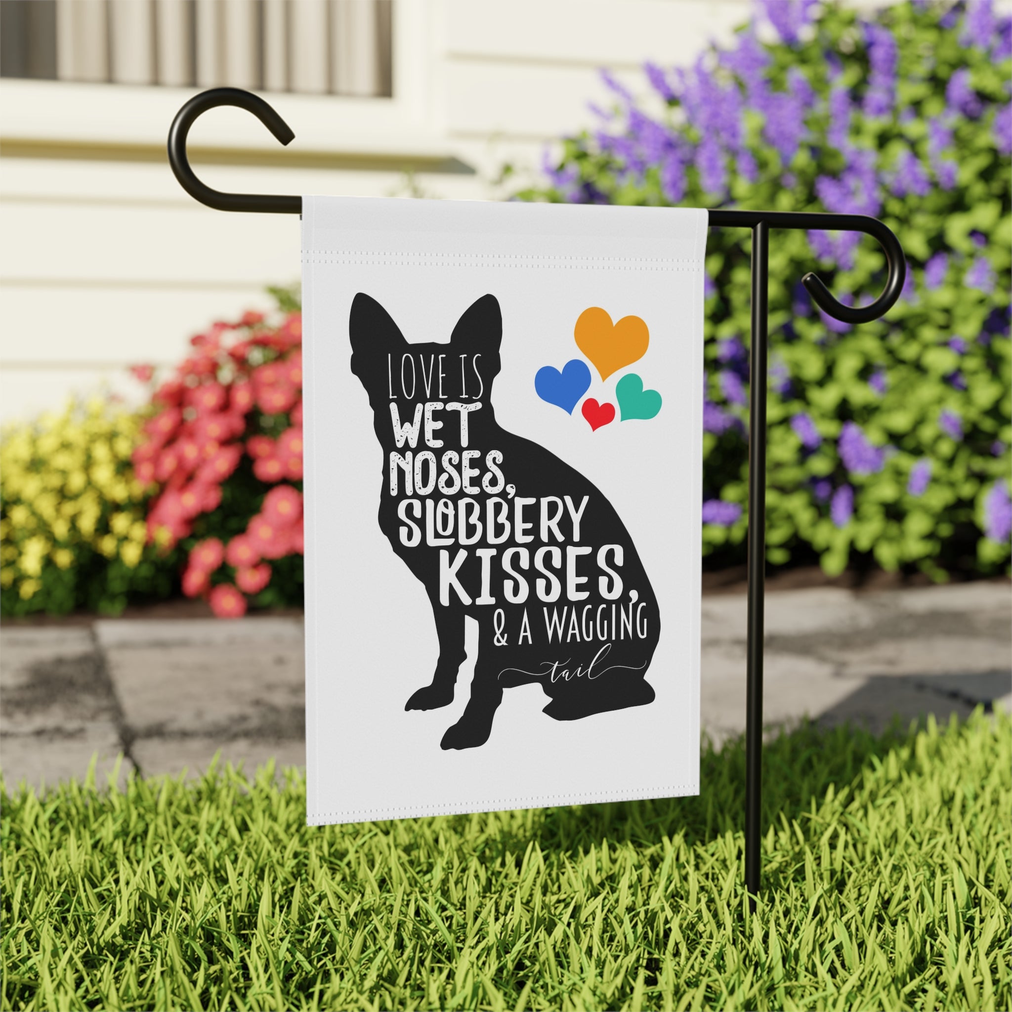 Close-up of Love Is Wet Nose Wagging Tail dog garden flag with hand-drawn detail