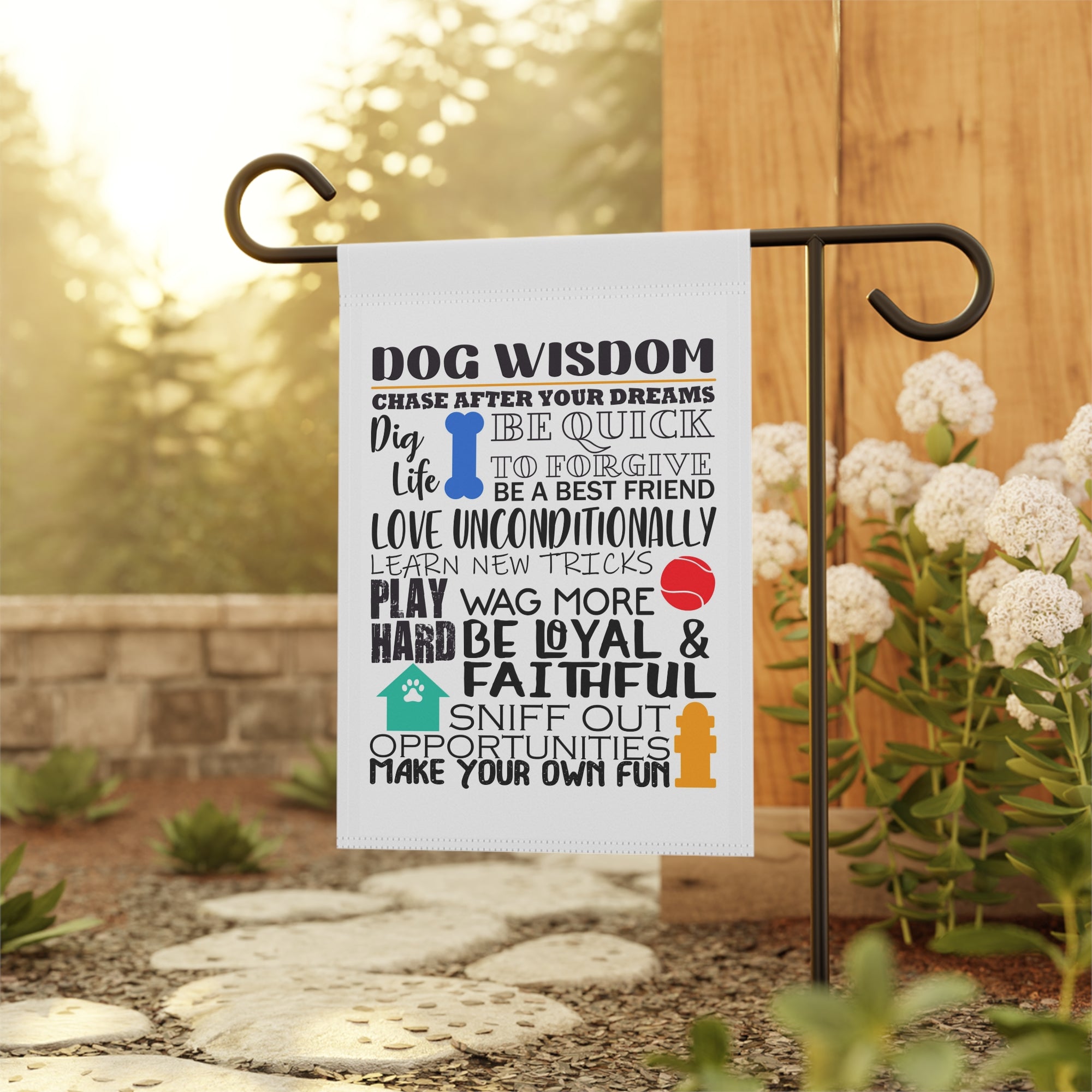 Inspirational dog wisdom garden flag displayed outdoors on a porch flag stand