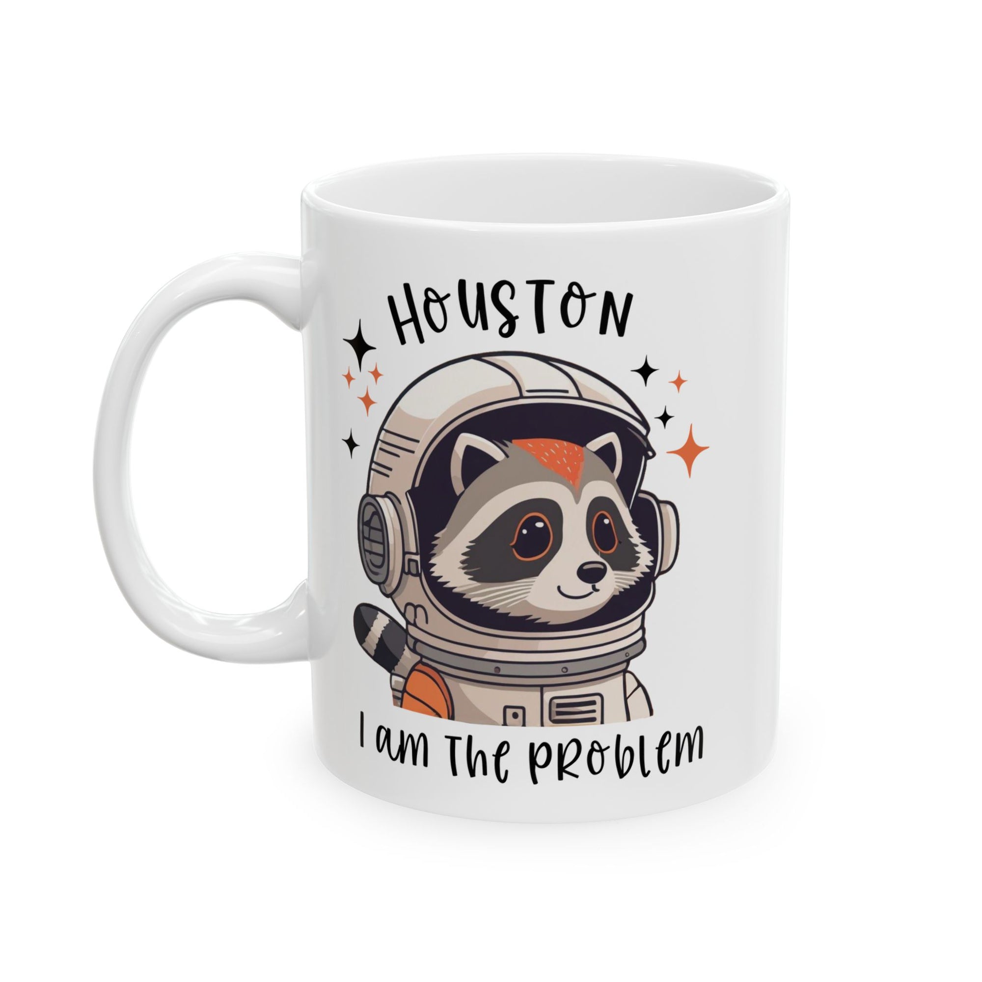 White mug with a cartoon raccoon astronaut design and text on a white background