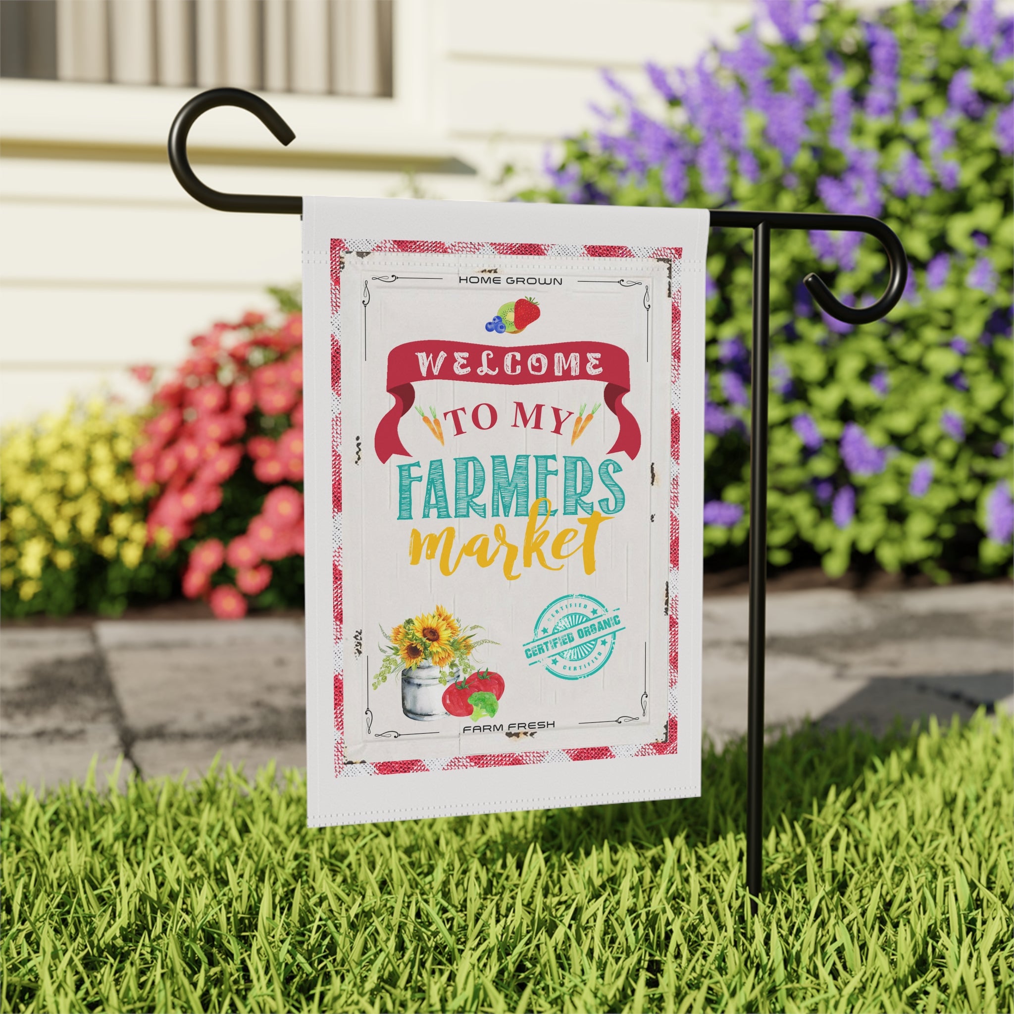 Close-up of Farmers Market garden flag with sunflower and vegetable illustration detail