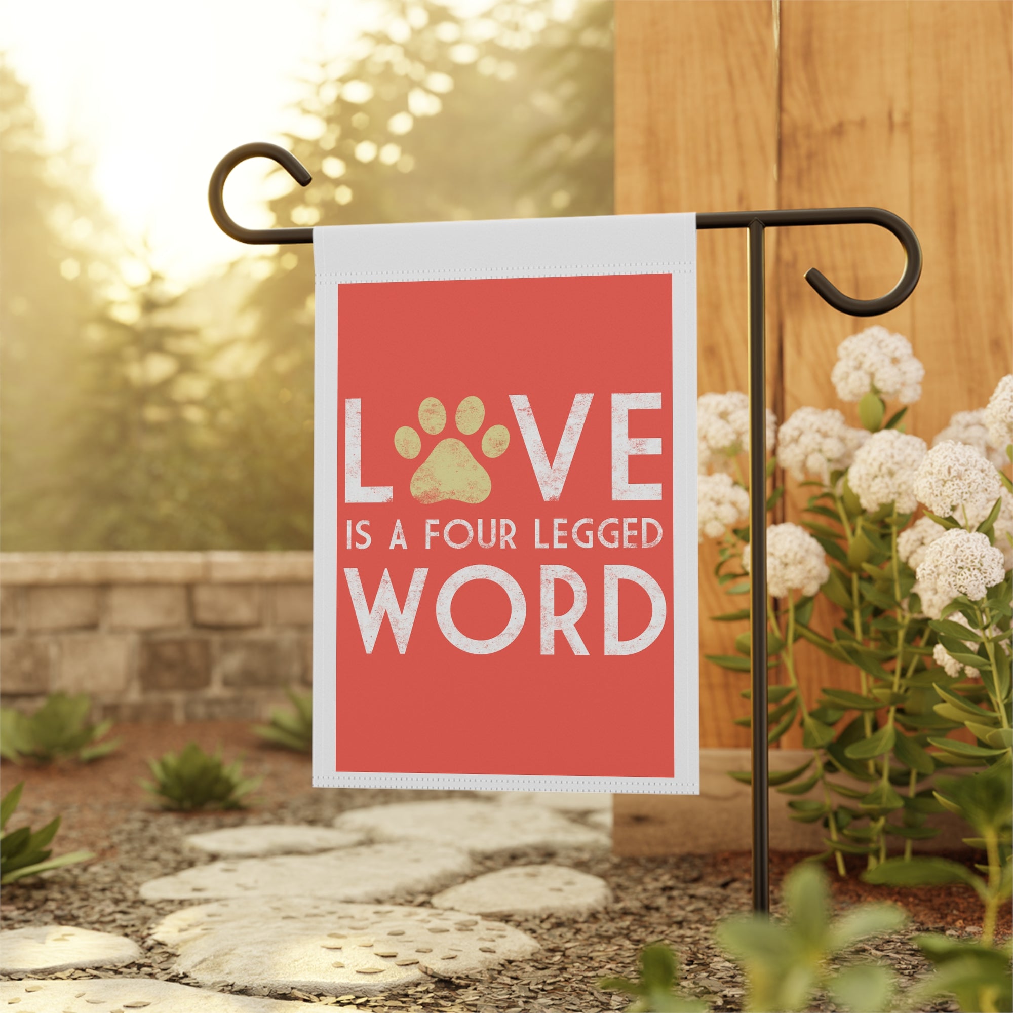 Sweet pet love garden flag displayed outdoors on a porch flag stand