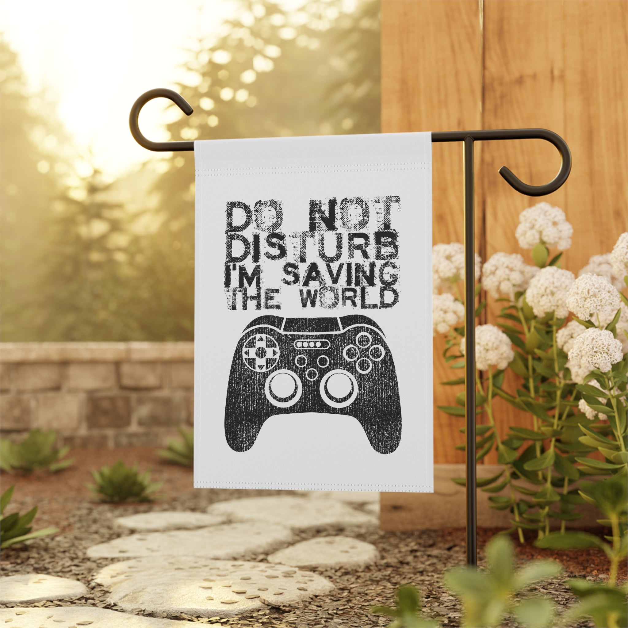 Saving The World gamer garden flag displayed outdoors on a porch flag stand