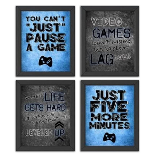 A set of four framed gaming-themed wall art prints with various video gaming phrases and when life gives hard it means you just leveled up.