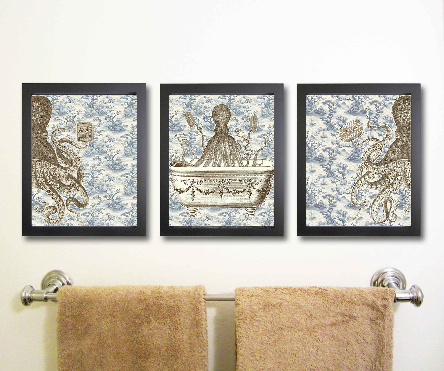 Three framed prints with octopus and chandelier designs above a towel rack.