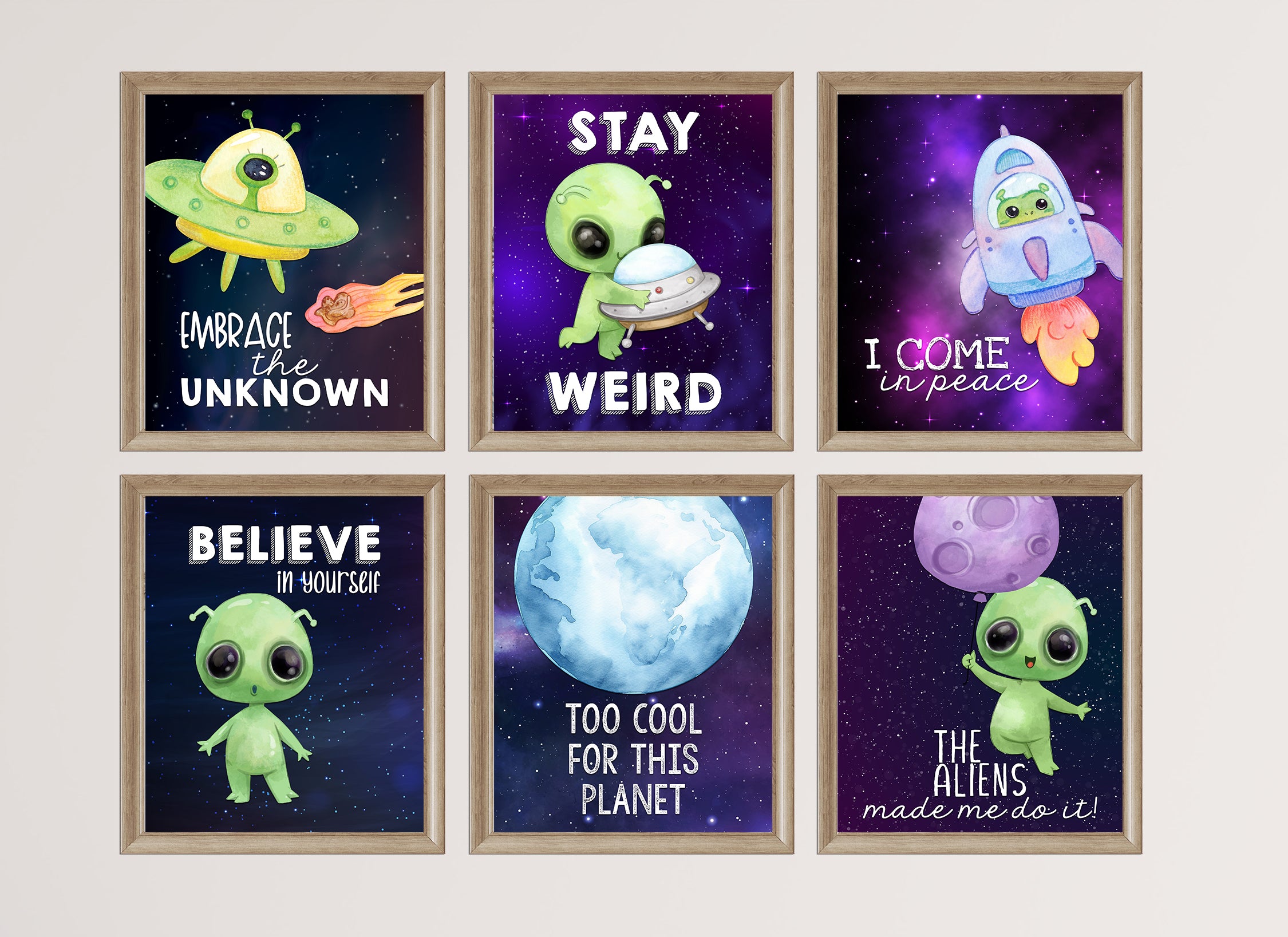 Set of six framed prints with alien illustrations and humorous quotes on a white wall.