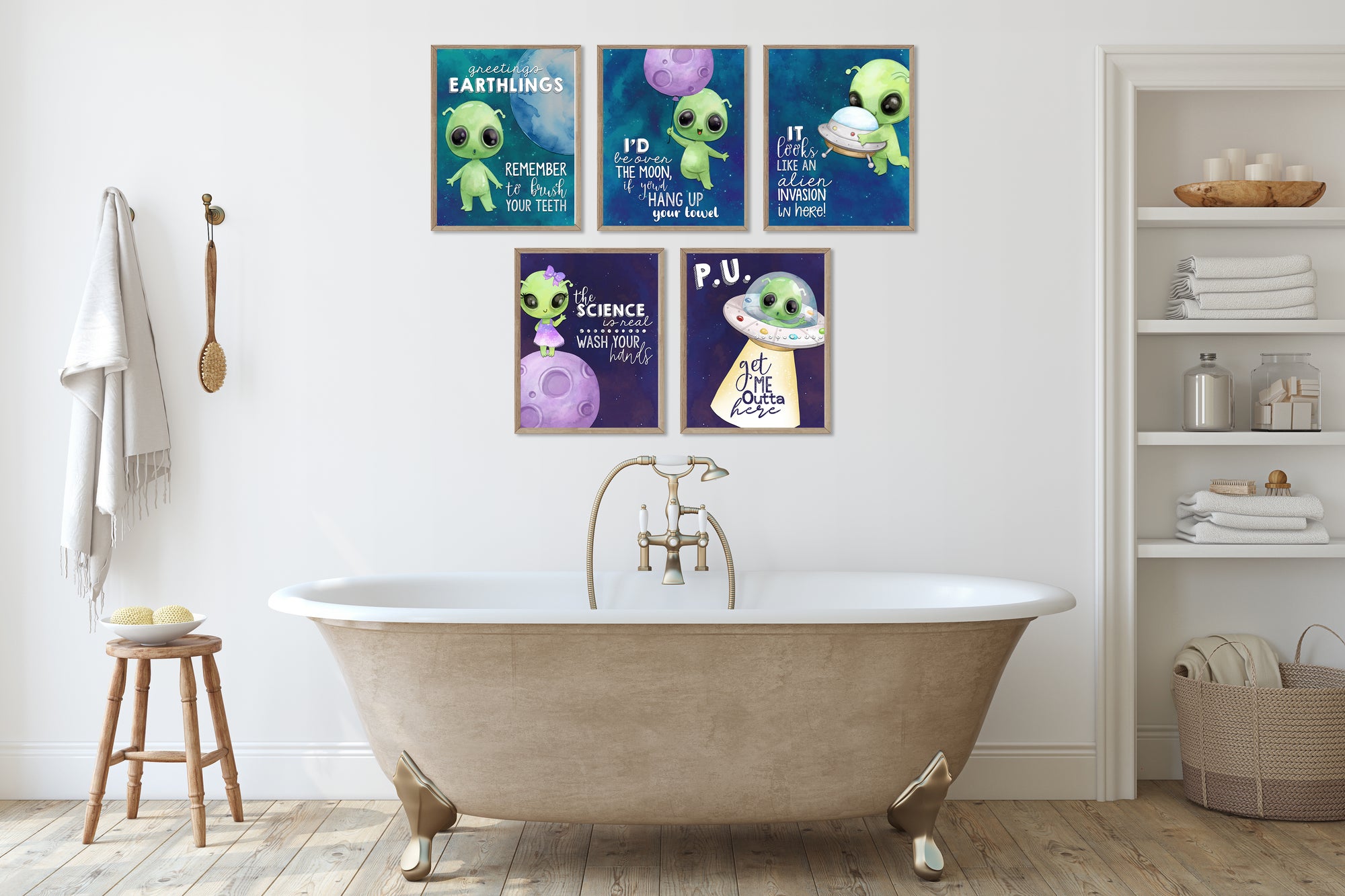 Bathroom with a bathtub and framed posters on the wall featuring cartoon characters.