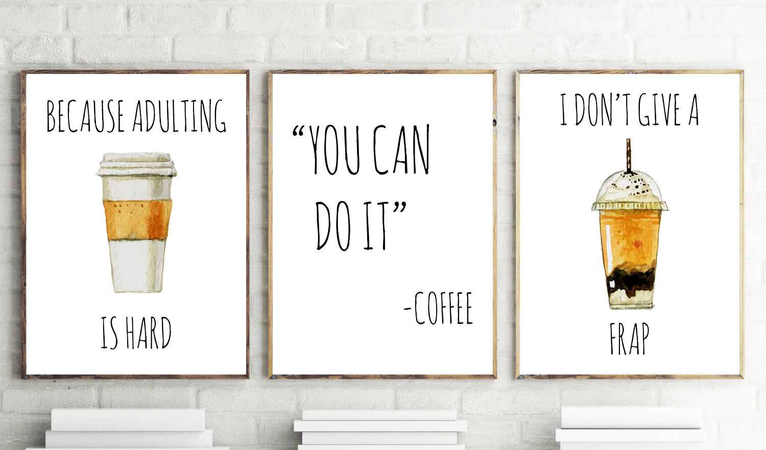 Three framed prints with coffee-themed sayings on a white brick wall background.